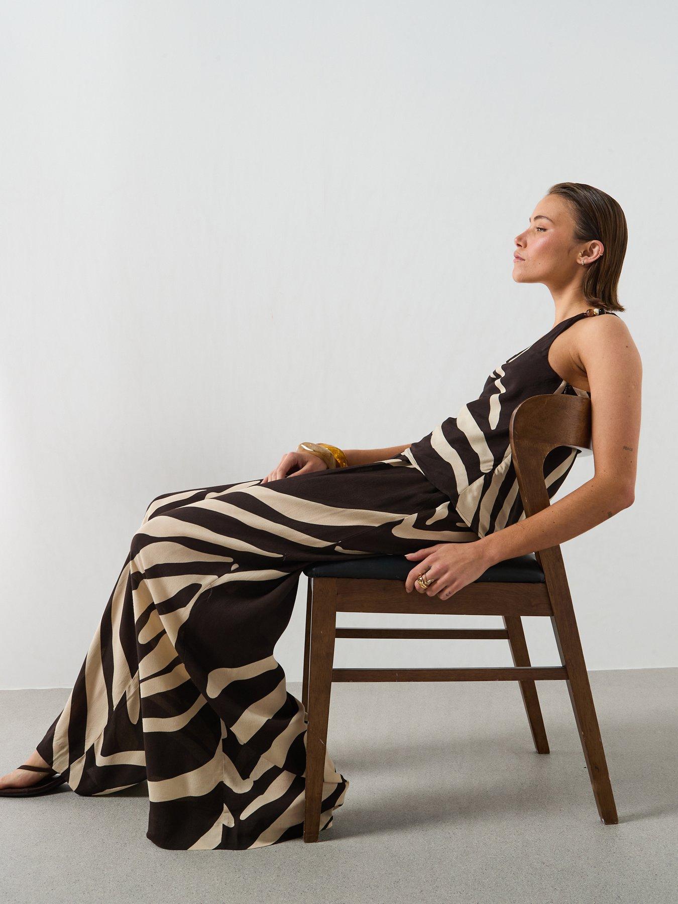 Image 4 of 6 of Mango Flowy Printed Co-Ord Trousers - Brown