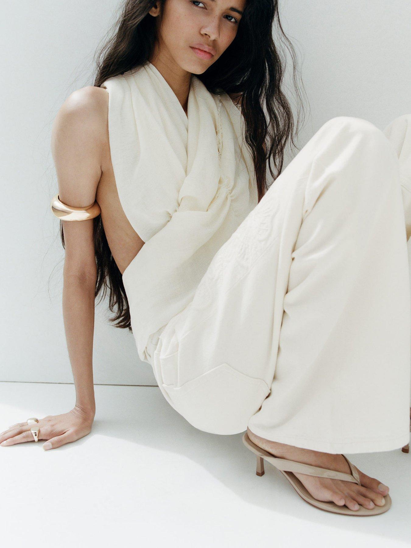 Image 5 of 5 of Mango Tiger Heeled Toe Post Sandals - Beige