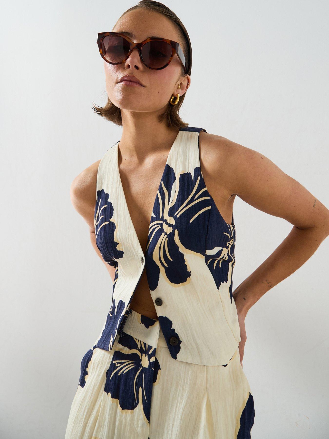 Image 1 of 6 of Mango Floral Print Co-ord Lyocell Vest - White