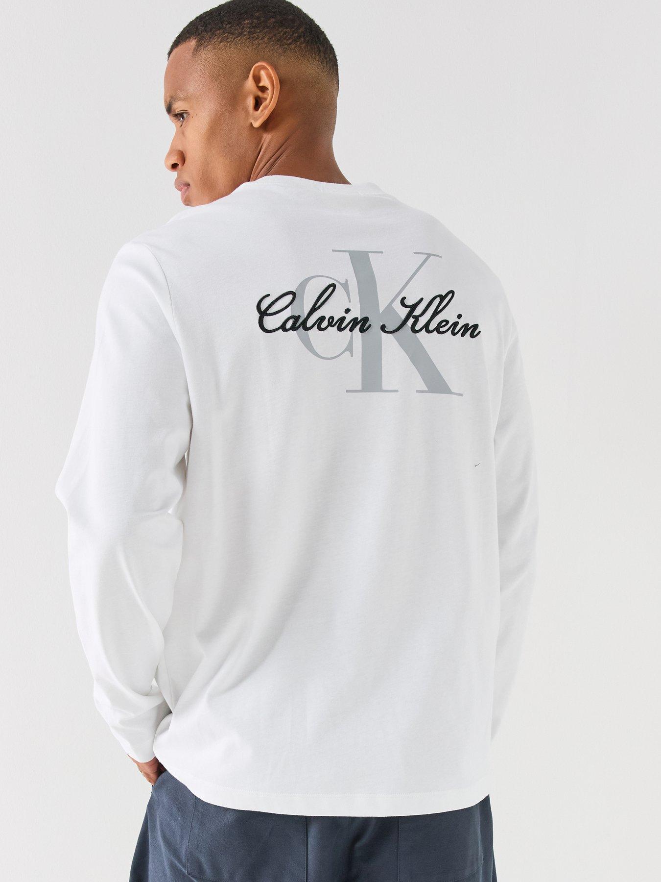 Image 1 of 6 of Calvin Klein Jeans Mens Relaxed Back Graphic Long Sleeve T-Shirt - White