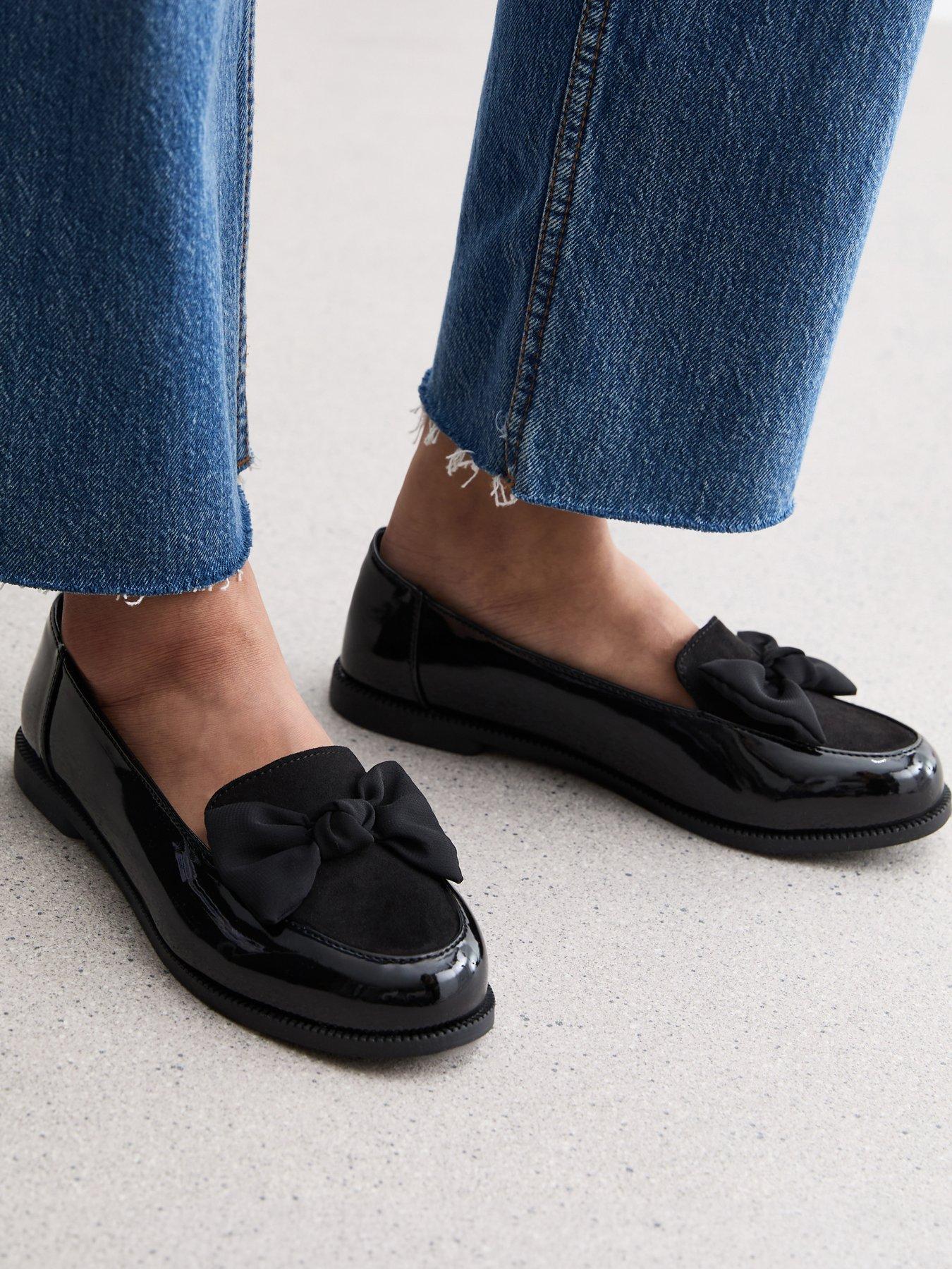 Image 1 of 4 of New Look Extra Wide Fit Patent Faux Leather Bow Front School Shoe&nbsp;Loafers - Black