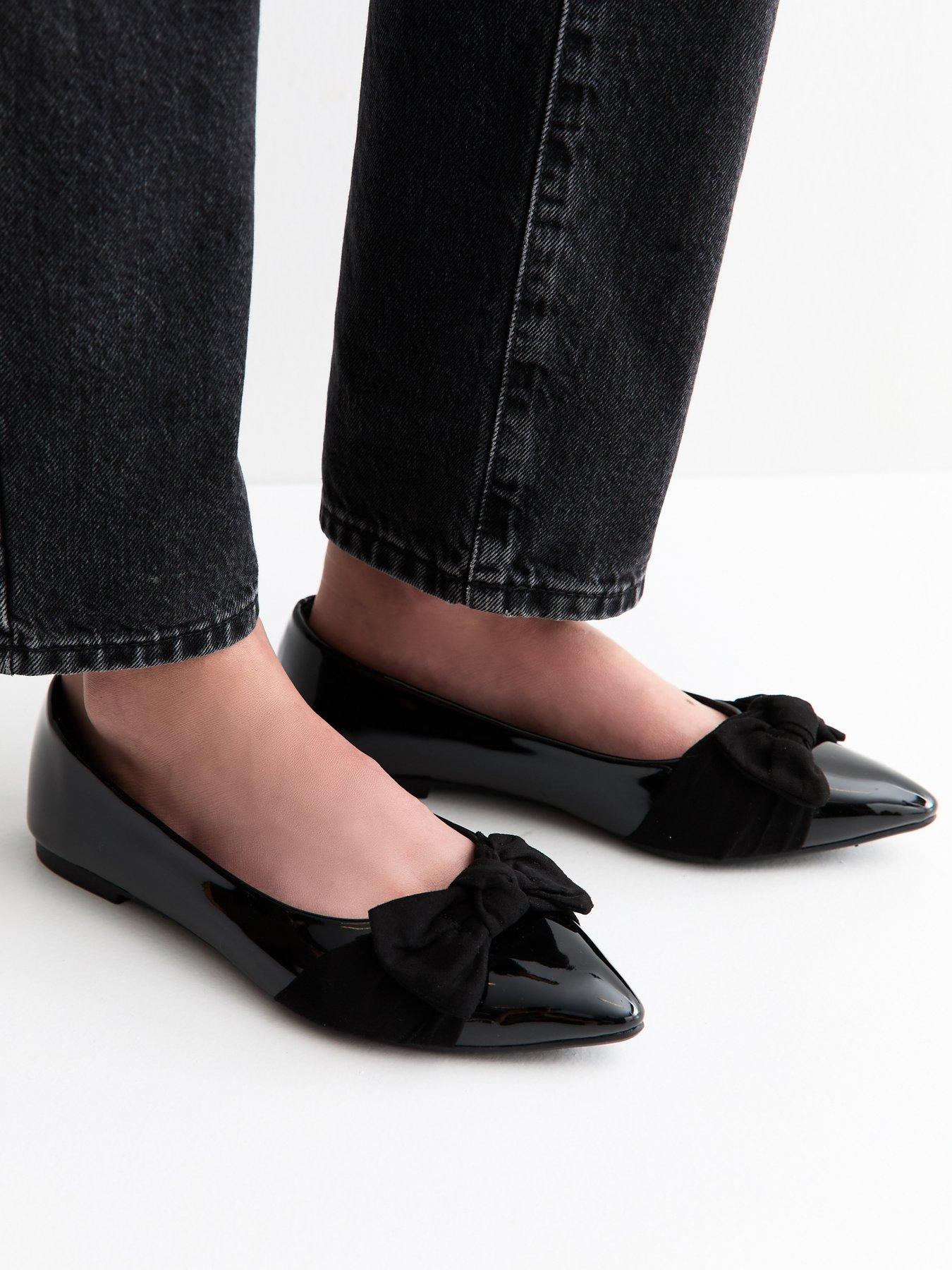 Image 1 of 5 of New Look Wide Fit Faux Leather Bow Ballet School Shoe&nbsp;Flats - Black