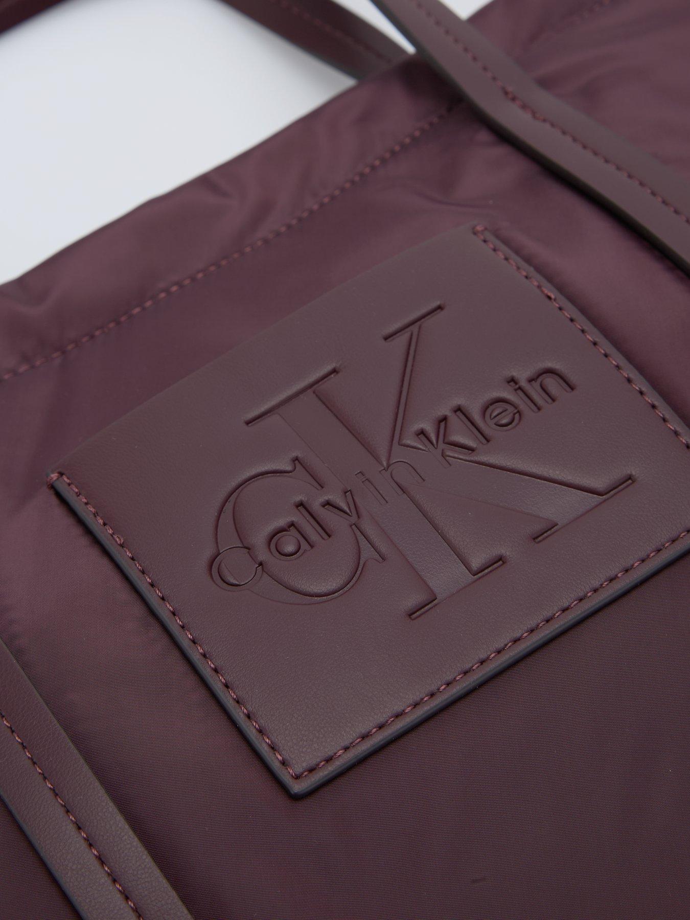 Image 3 of 4 of Calvin Klein Monologo Pocket Crossbody Tote Bag - Brown