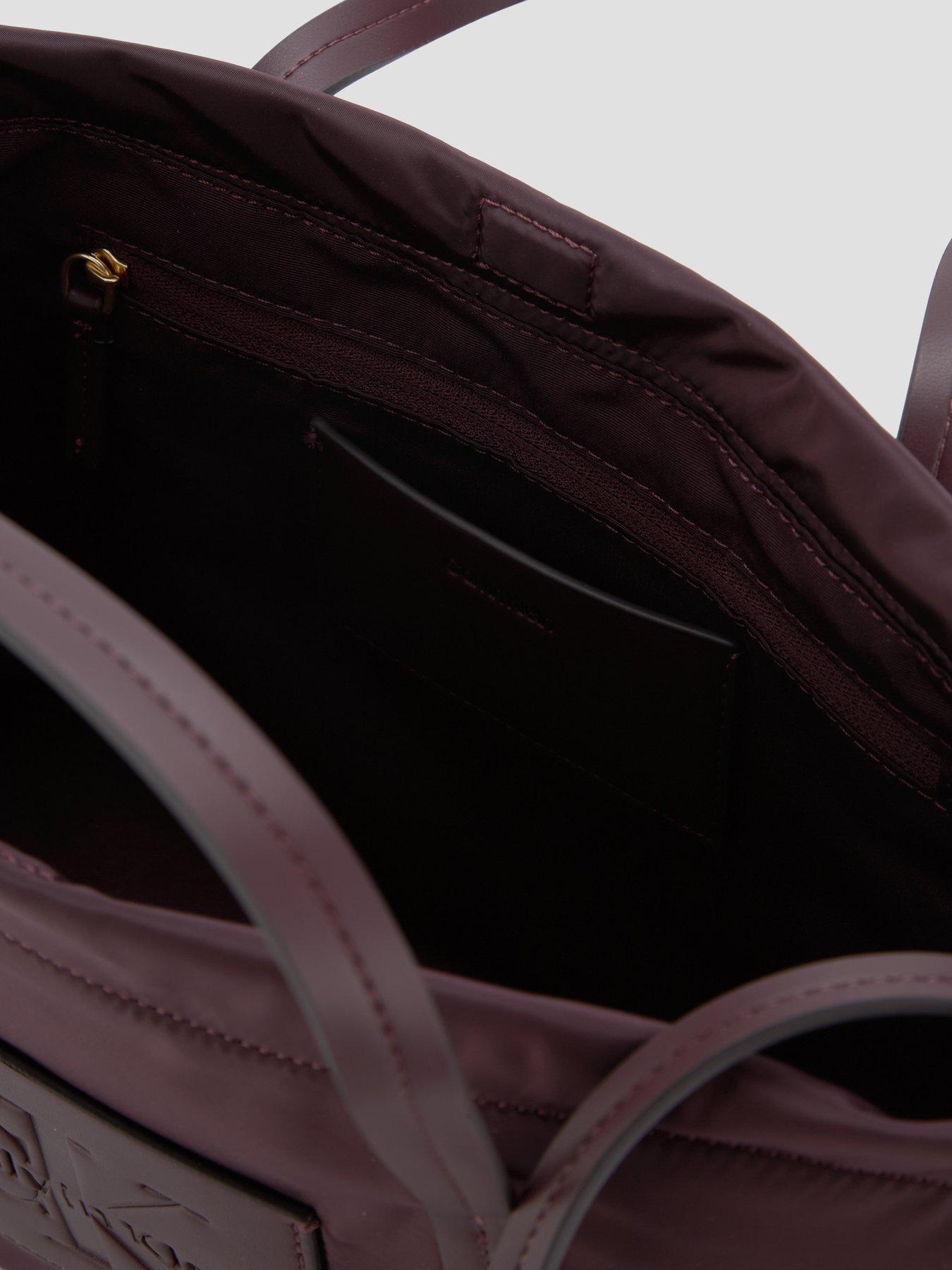 Image 4 of 4 of Calvin Klein Monologo Pocket Crossbody Tote Bag - Brown