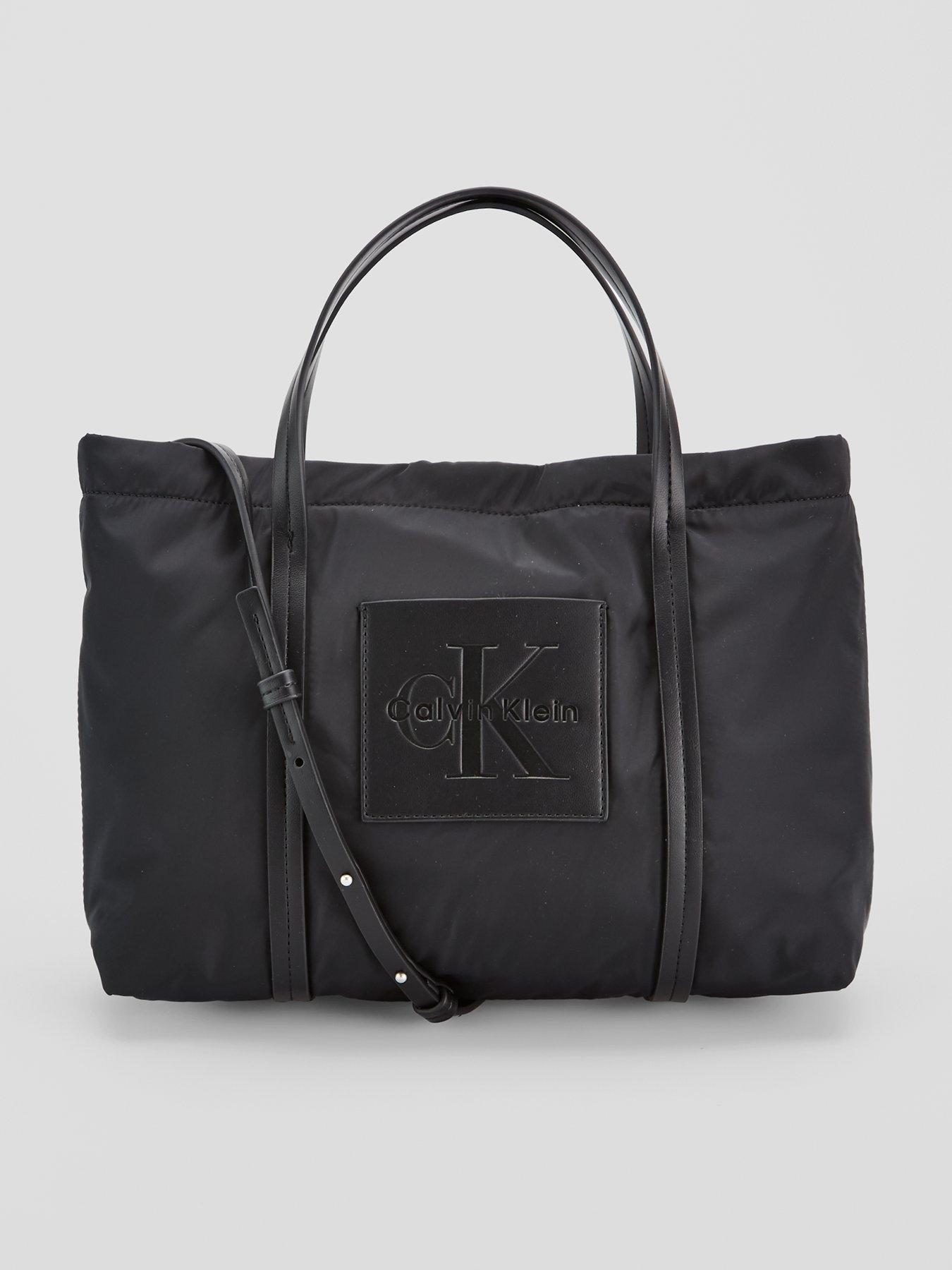 Image 1 of 4 of Calvin Klein Monologo Pocket Crossbody Tote Bag - Black