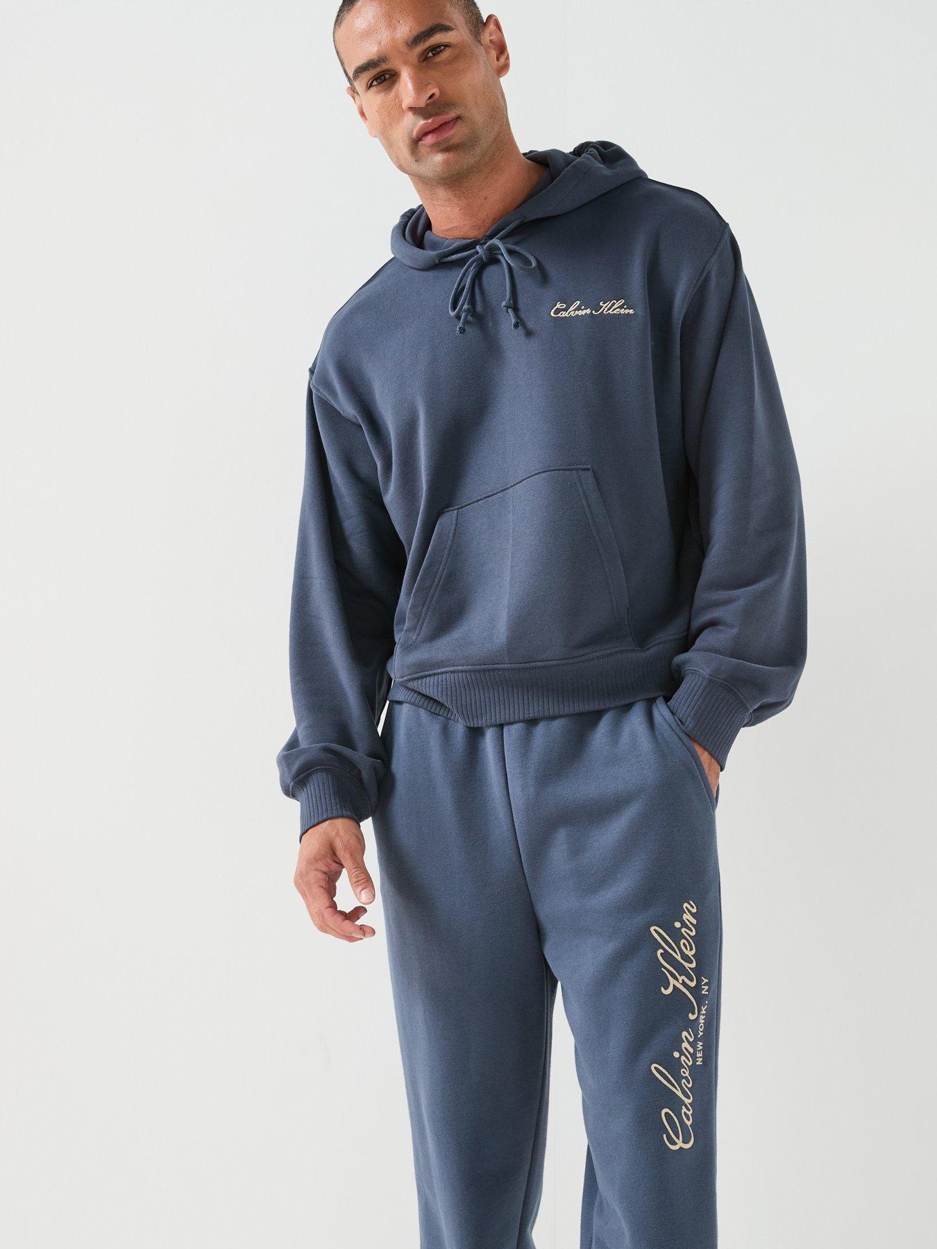 Image 6 of 6 of Calvin Klein Script Tracksuits - Blue
