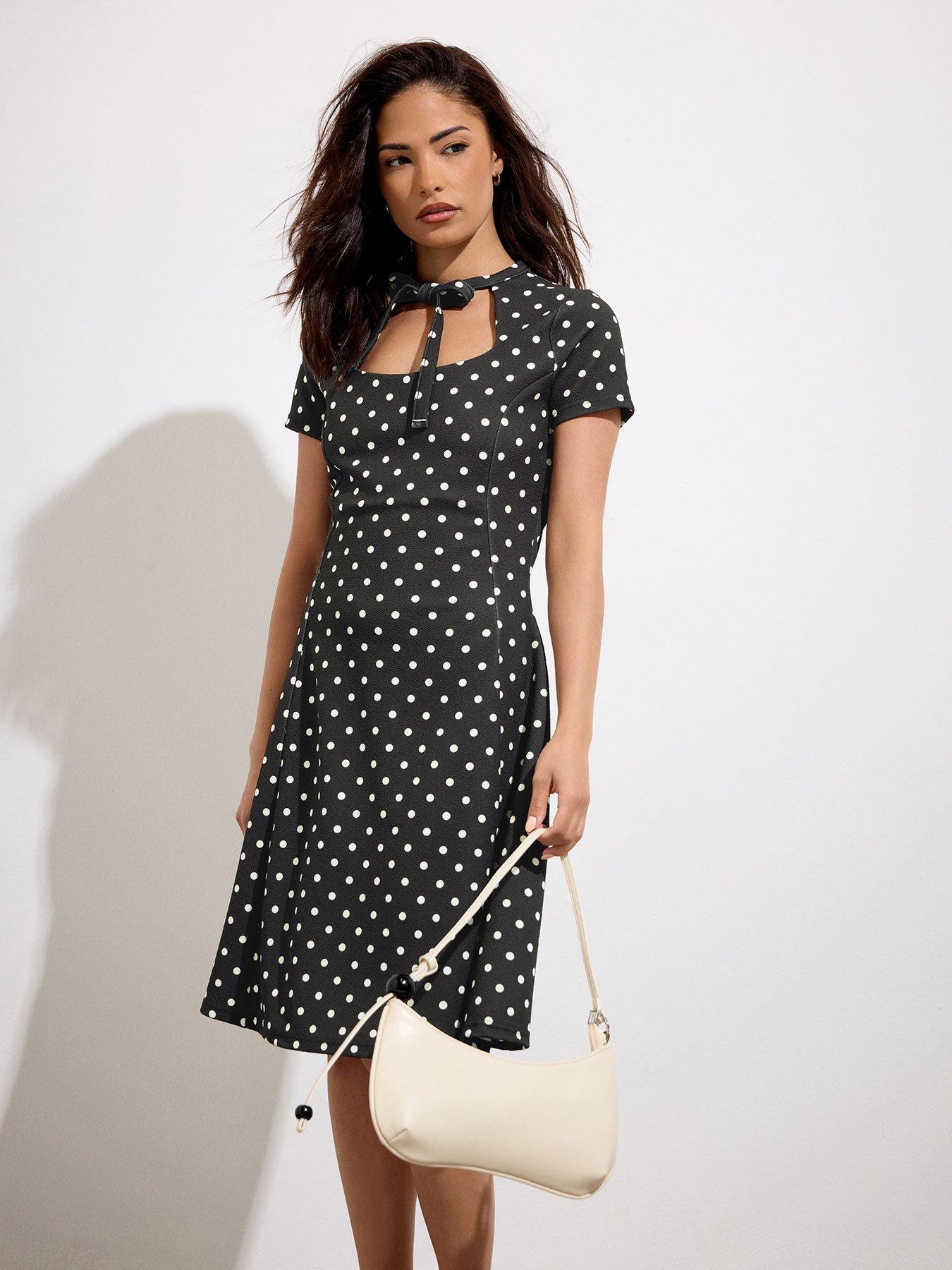 Image 1 of 4 of PixieGirl Petite Polka Dot Tie Front Mini Dress