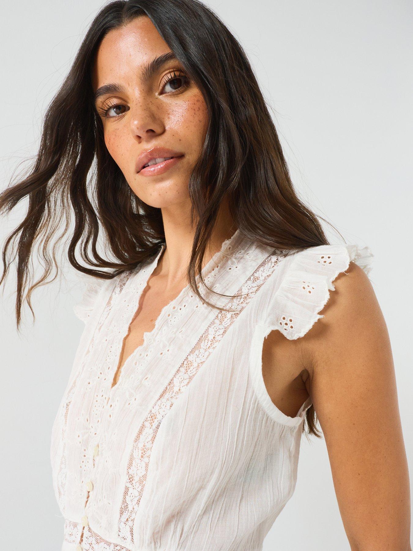 Image 6 of 6 of FREE PEOPLE Embroidered Peplum Button&nbsp;Front Cotton Top - White