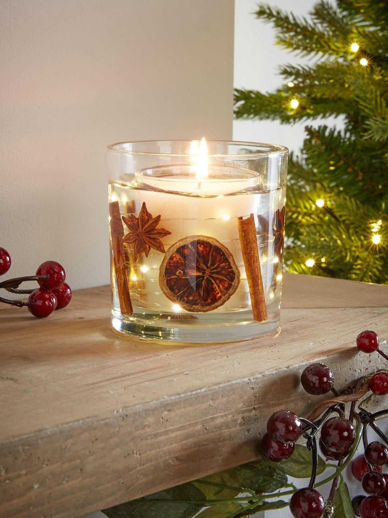 Image 1 of 7 of Festive Star & Cinnamon Flicker Glow Led Candle - Battery Operated - 10cm