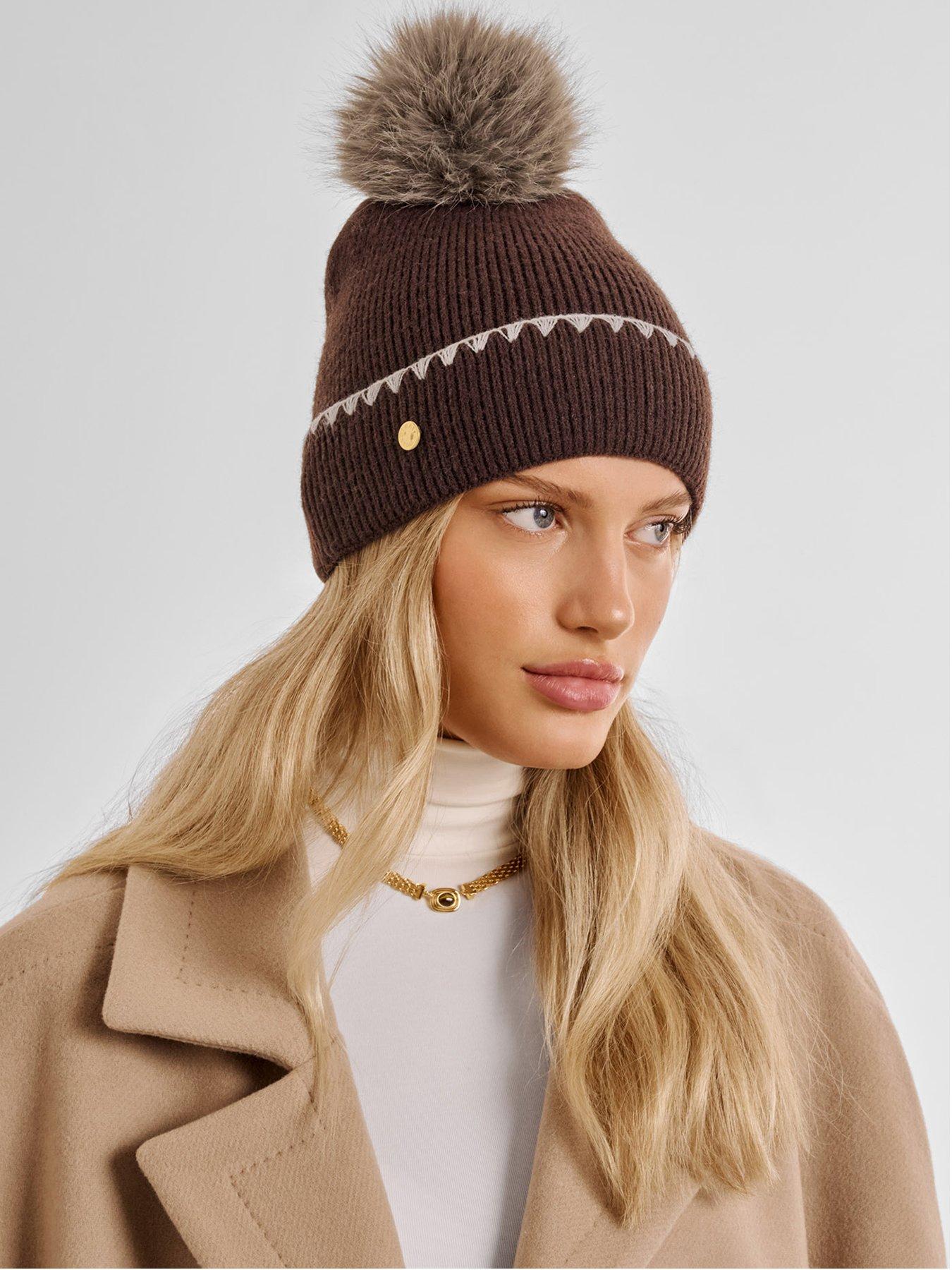 Image 1 of 6 of Katie Loxton Whipstitch Pom Pom Knitted Hat - Chocolate