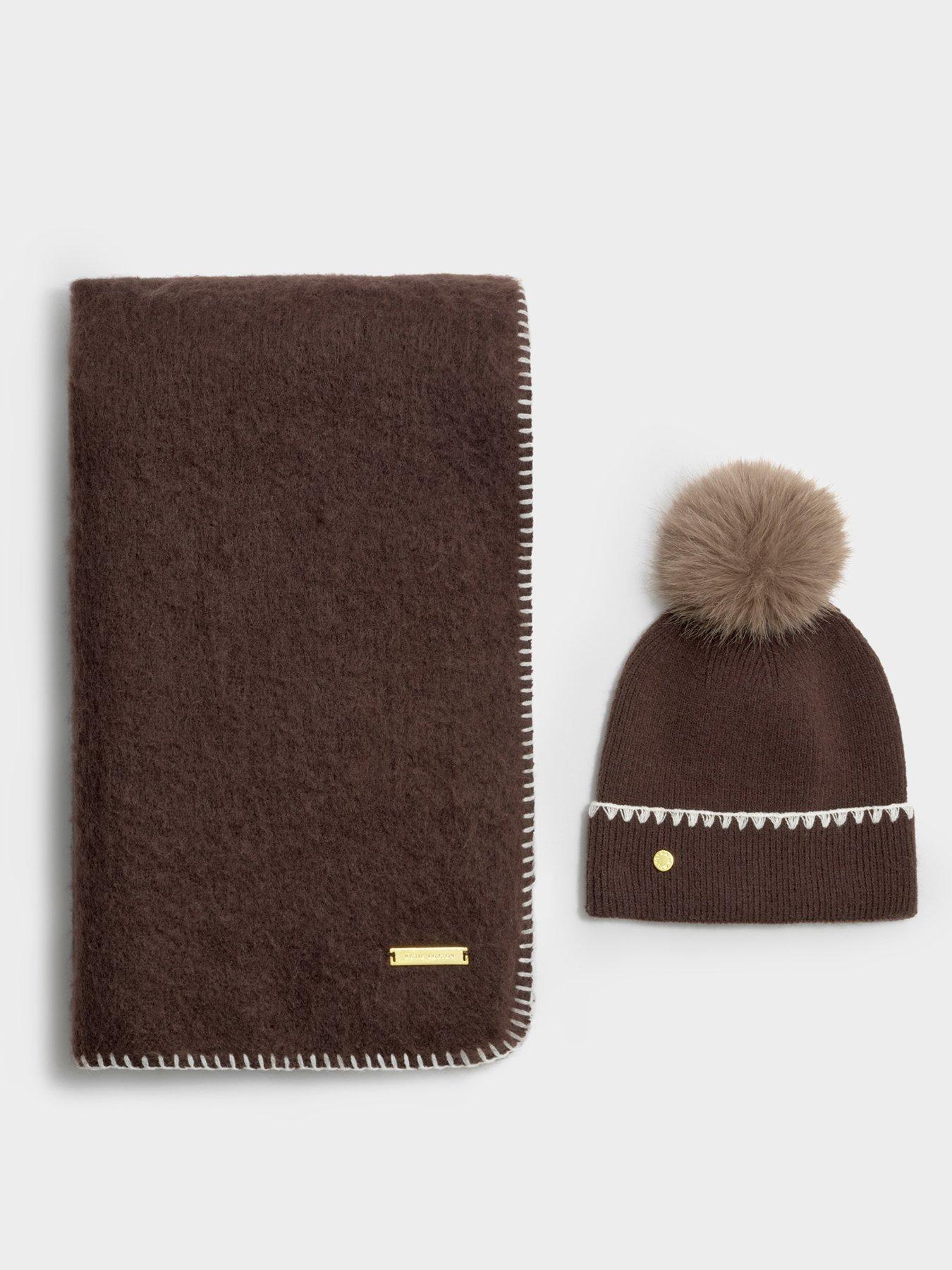 Image 5 of 6 of Katie Loxton Whipstitch Pom Pom Knitted Hat - Chocolate