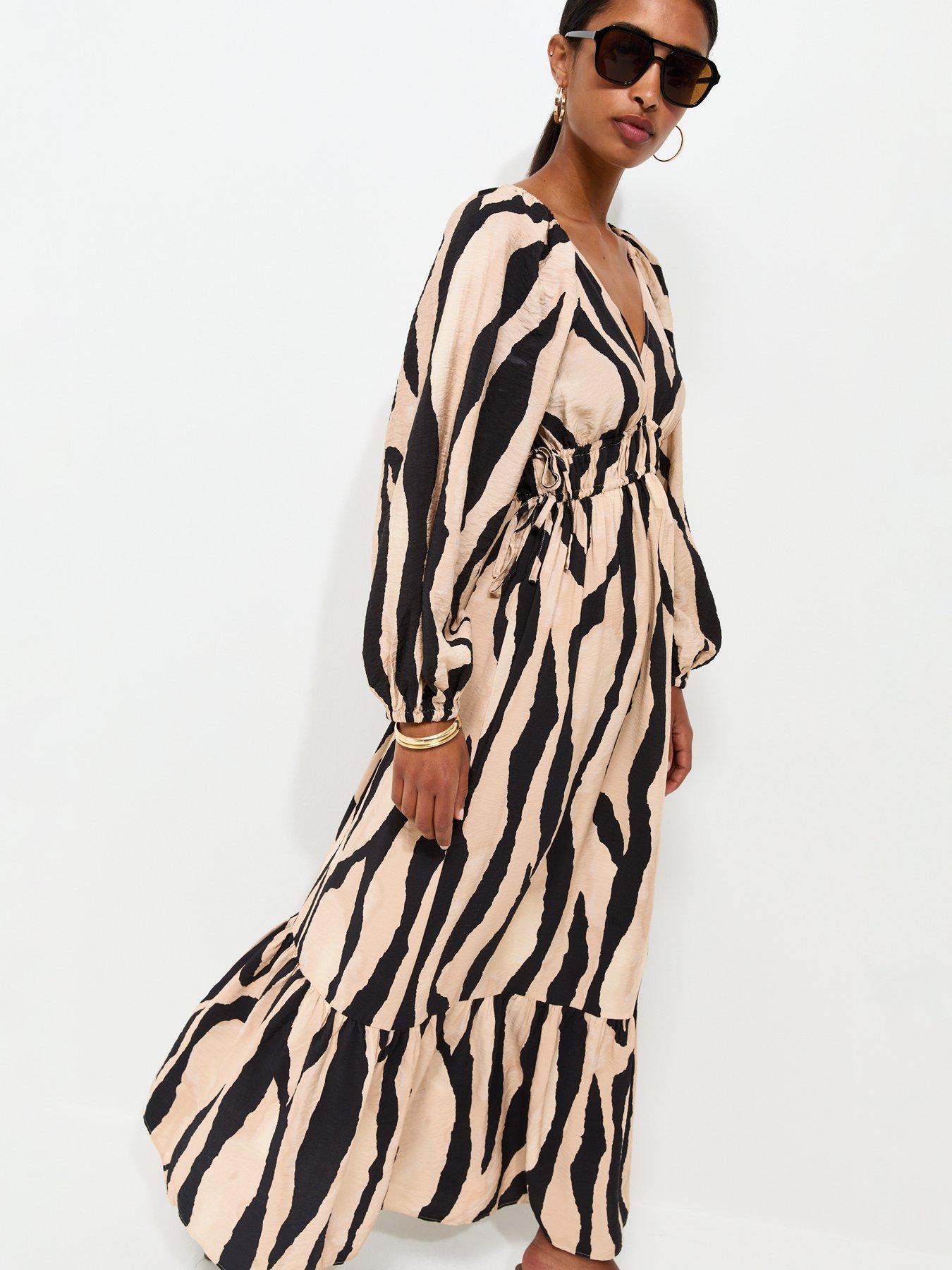 Image 1 of 6 of New Look Abstract Print V-Neck Maxi Dress - Brown
