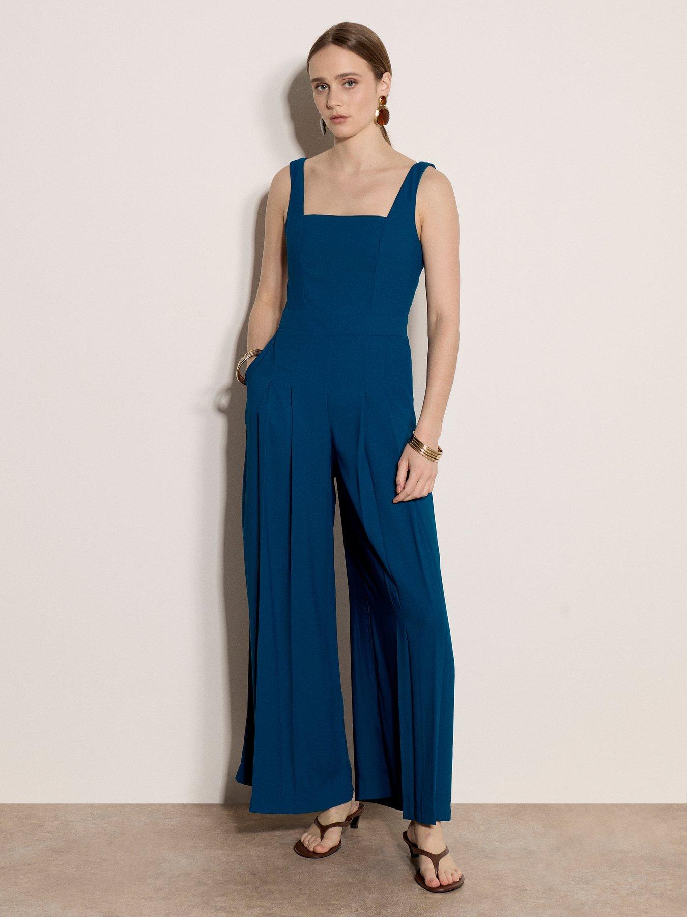 Image 1 of 4 of Apricot Shirred Back Wide Leg Jumpsuit - Blue