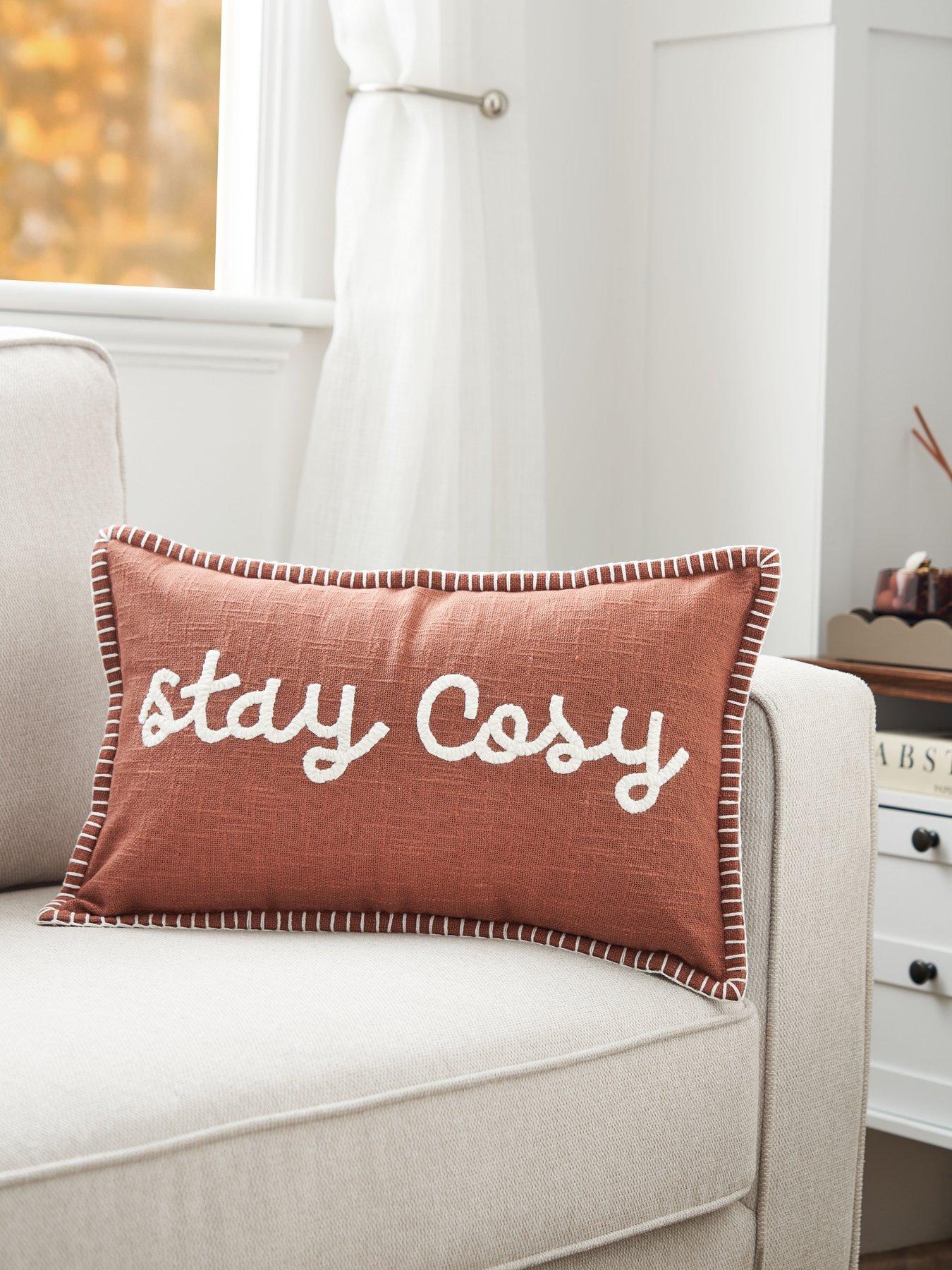 Image 1 of 6 of The Very Collection Stay Cosy Embroidered Bolster Cushion - Brown