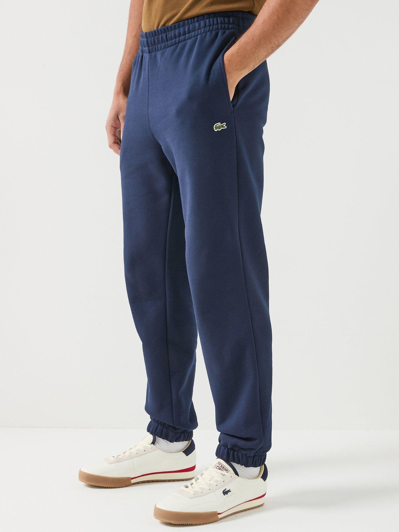 Image 1 of 6 of Lacoste Regular Fit Brushed Fleece Cuffed Joggers - Navy