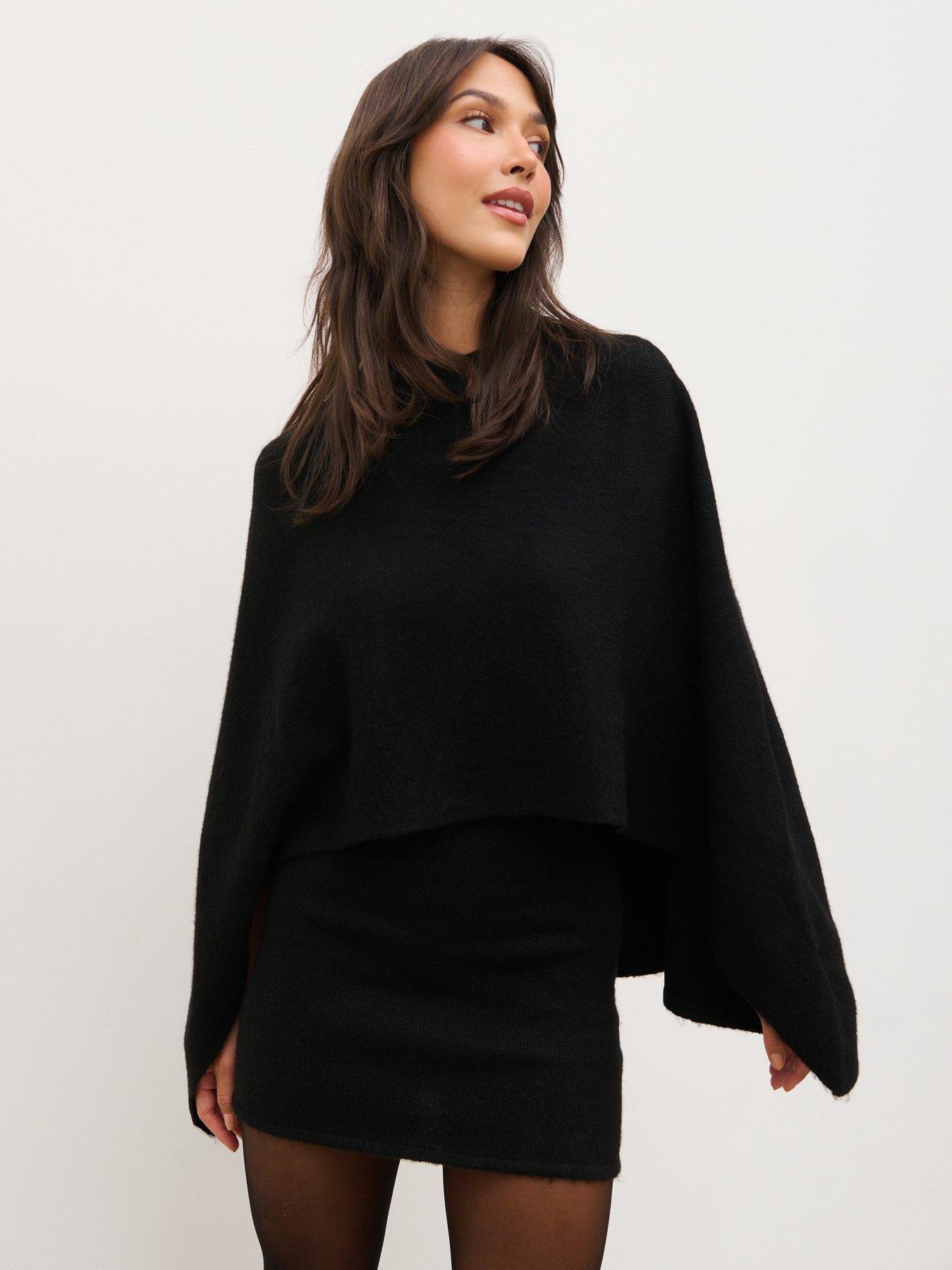 Image 1 of 4 of Pretty Lavish Halle Cape Detail Knit Mini Dress - Black
