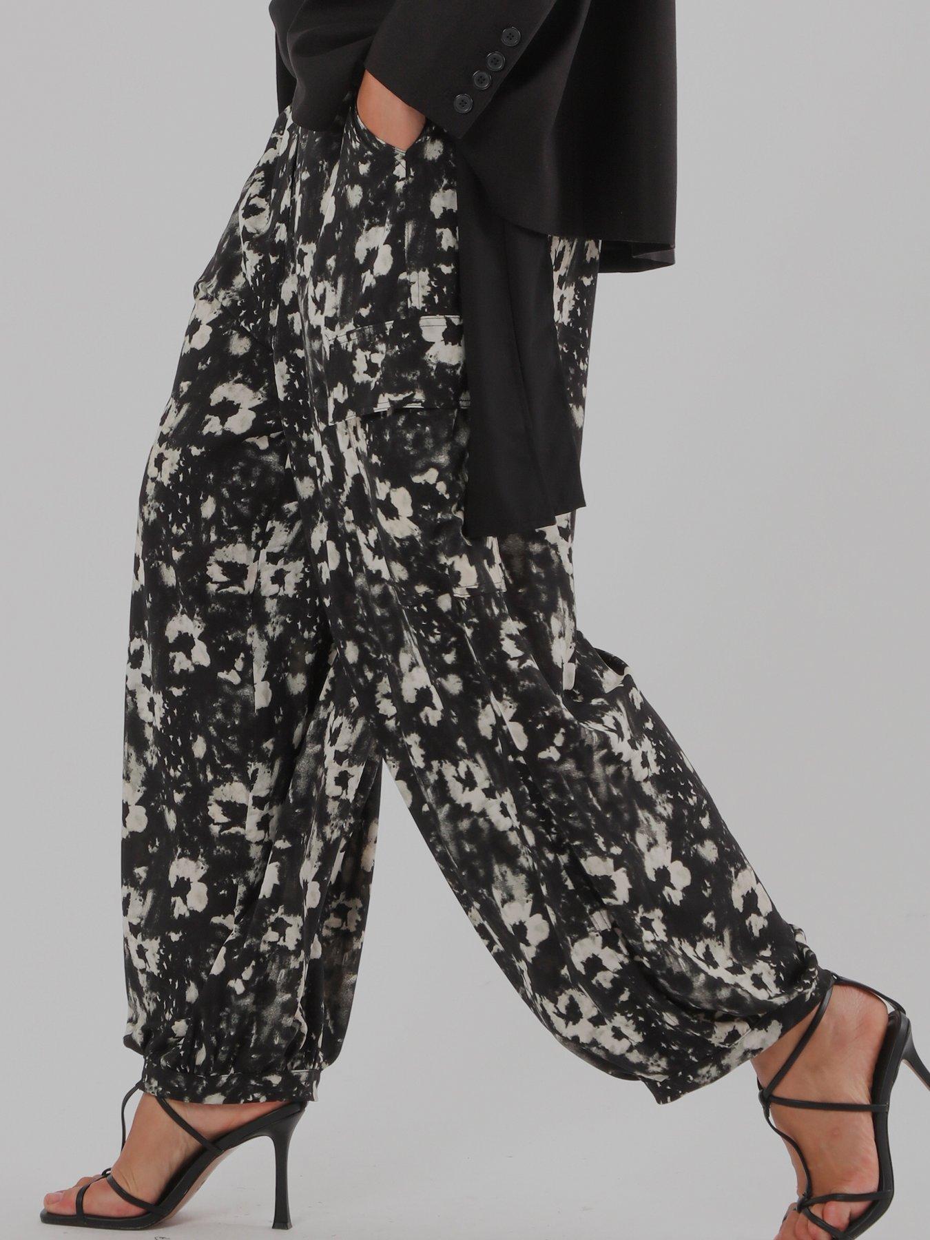 Image 4 of 7 of Religion Flora Print Black Ash Balloon Trousers - White