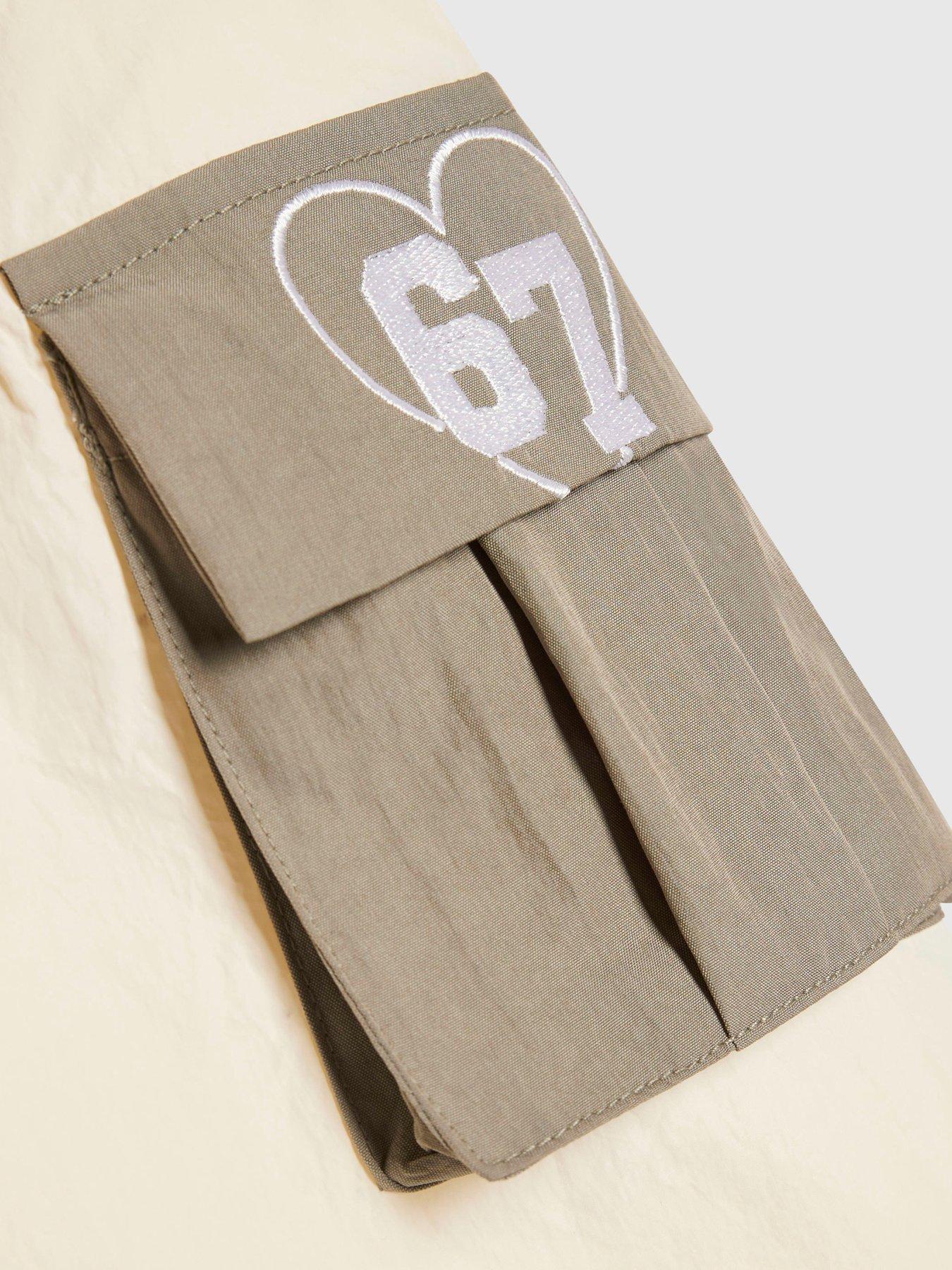 Image 4 of 5 of River Island Mini Girls Colour Block Nylon Skirt Set - Cream