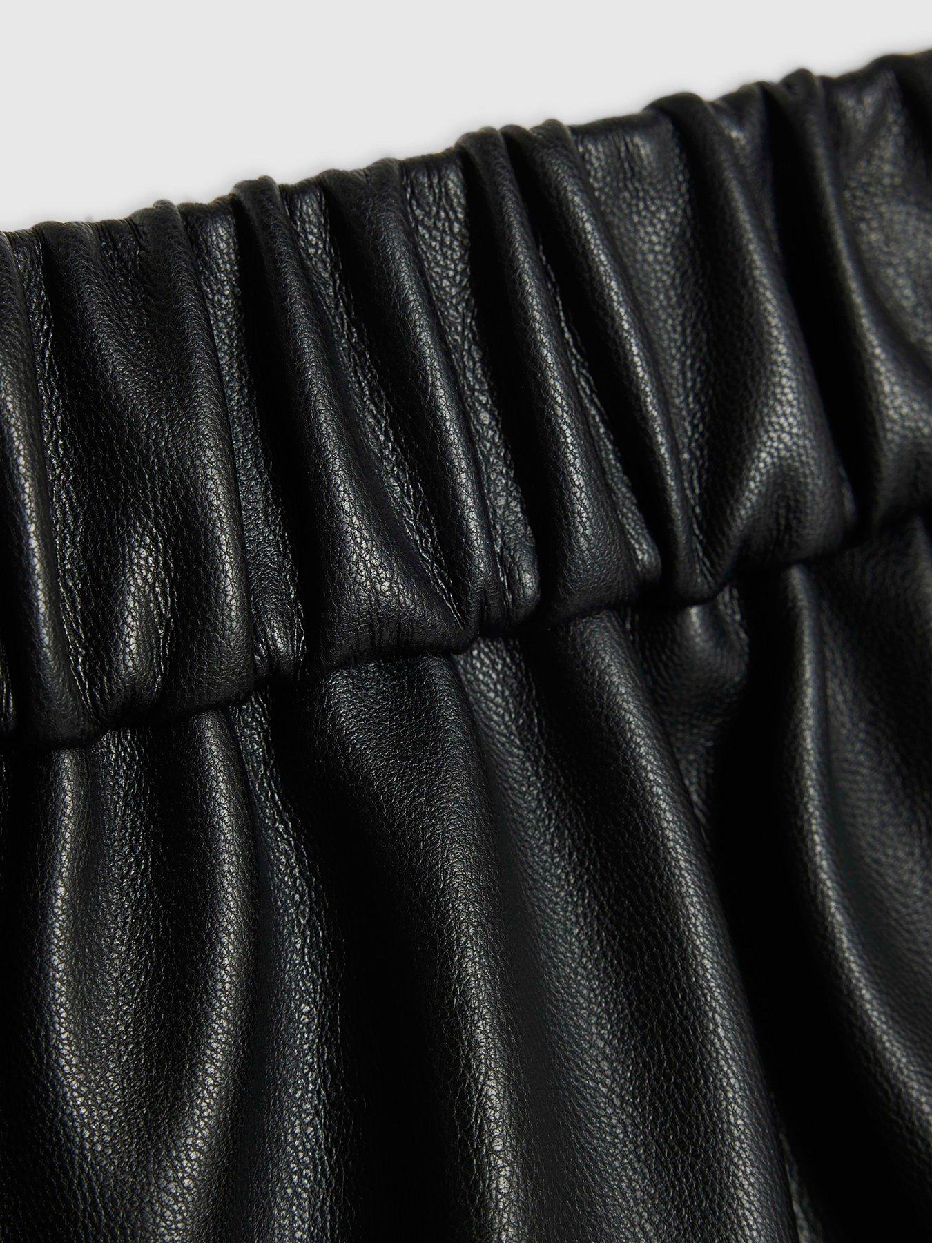 Image 4 of 4 of River Island Girls Faux Leather Tulip Pleated Shorts - Black
