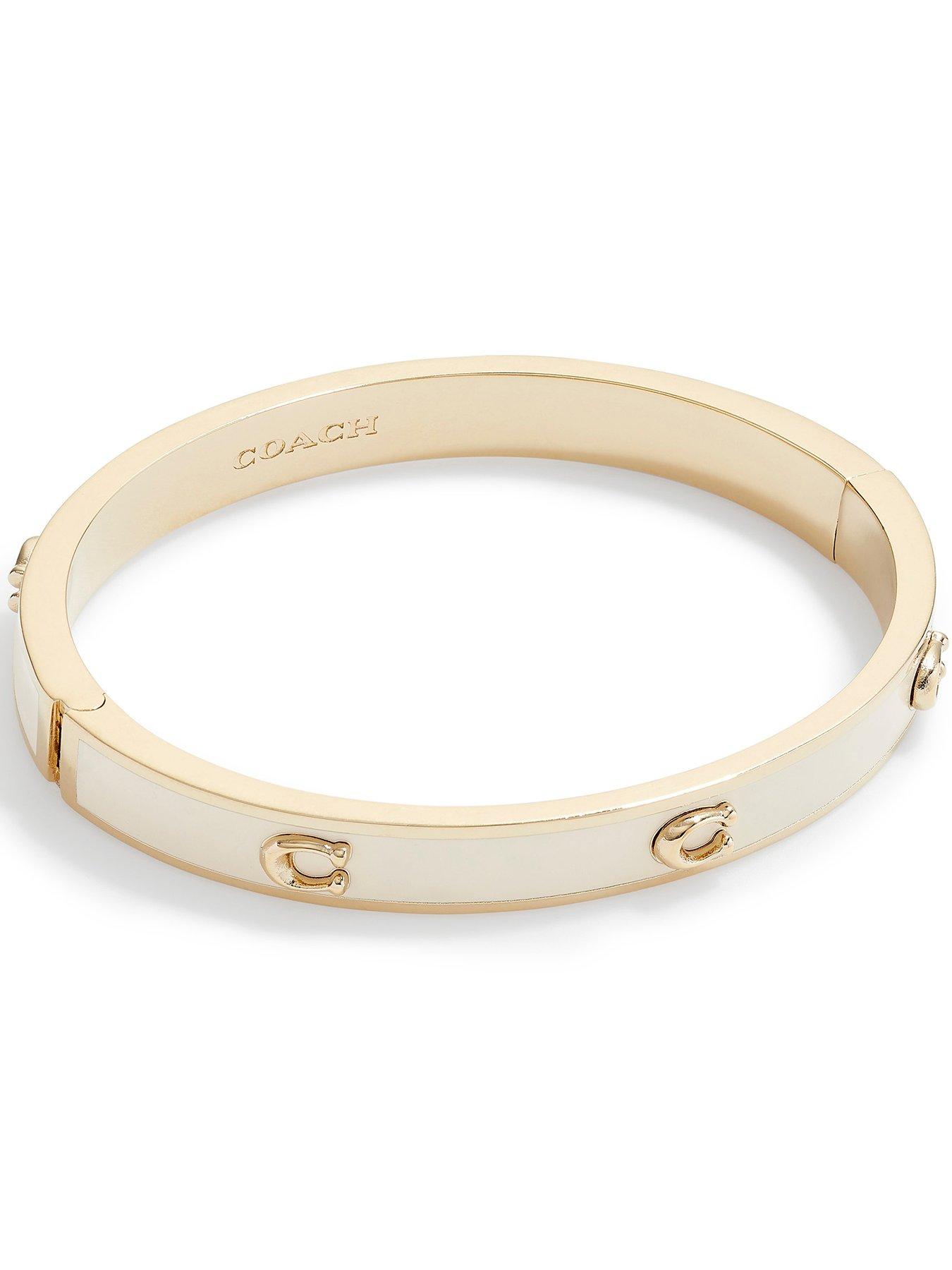 Image 1 of 3 of COACH Pegged C Enamel Hinge Bangle