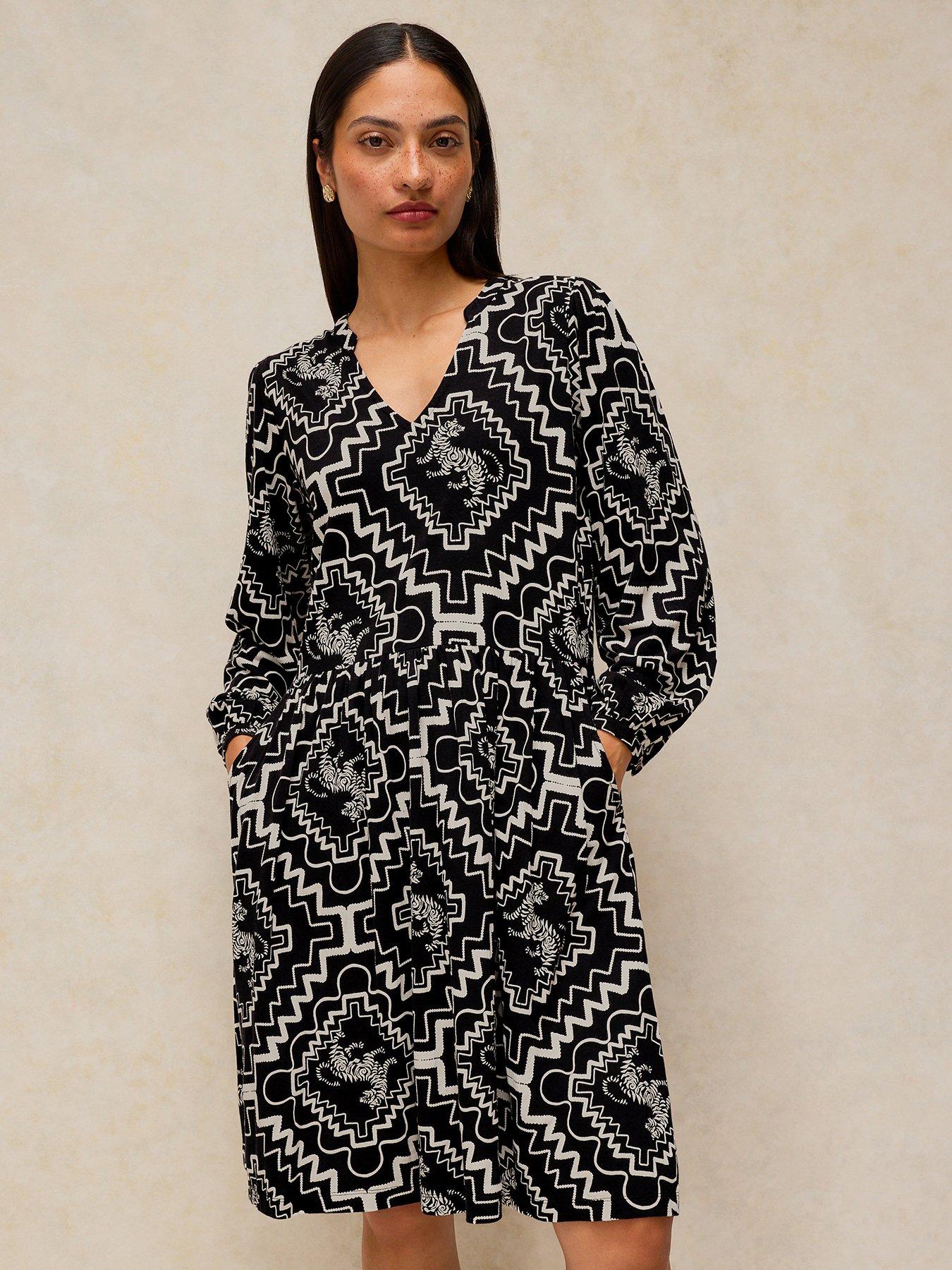 Image 1 of 5 of White Stuff Womens Lola Monochrome Print V-Neck Jersey Dress - Black