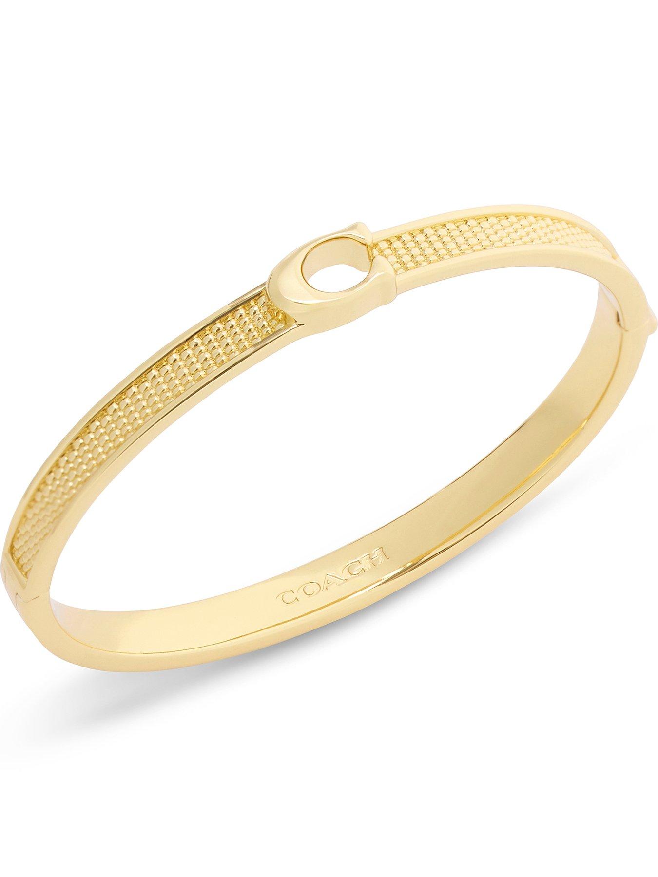 Image 1 of 3 of COACH Textured Coach Hinged Bangle - Gold