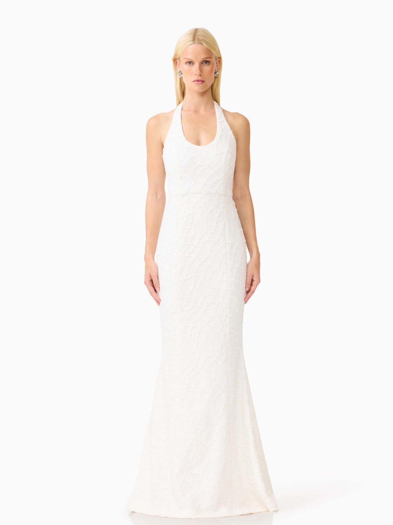 Image 5 of 6 of Elliatt Alexandra Halter Neck Gown With Mermaid Hemline - White