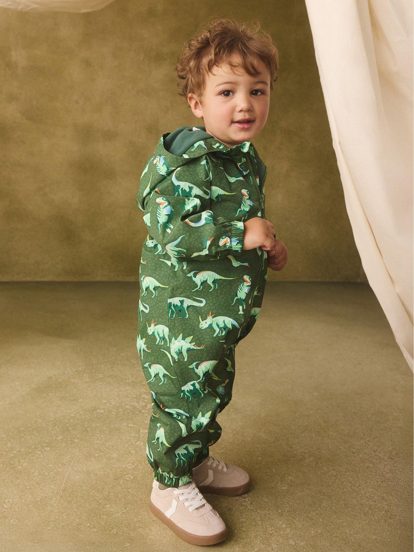 Image 1 of 7 of Cath Kidston Boys Dino Print Fleece Lined Zip Through Puddlesuit - Green