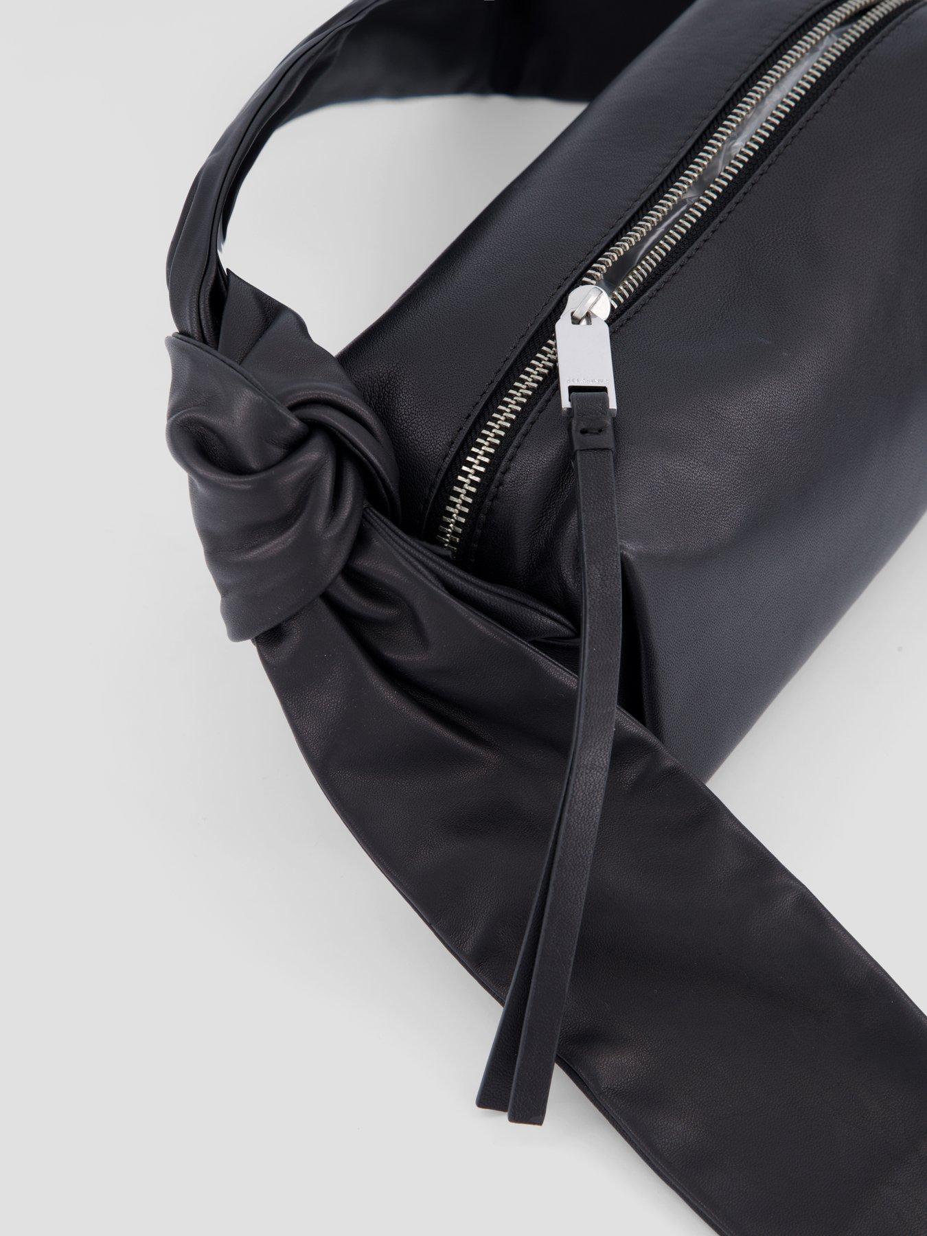 Image 3 of 5 of AllSaints Womens Knotted Strap Zip-Top Baguette Shoulder Bag - Black