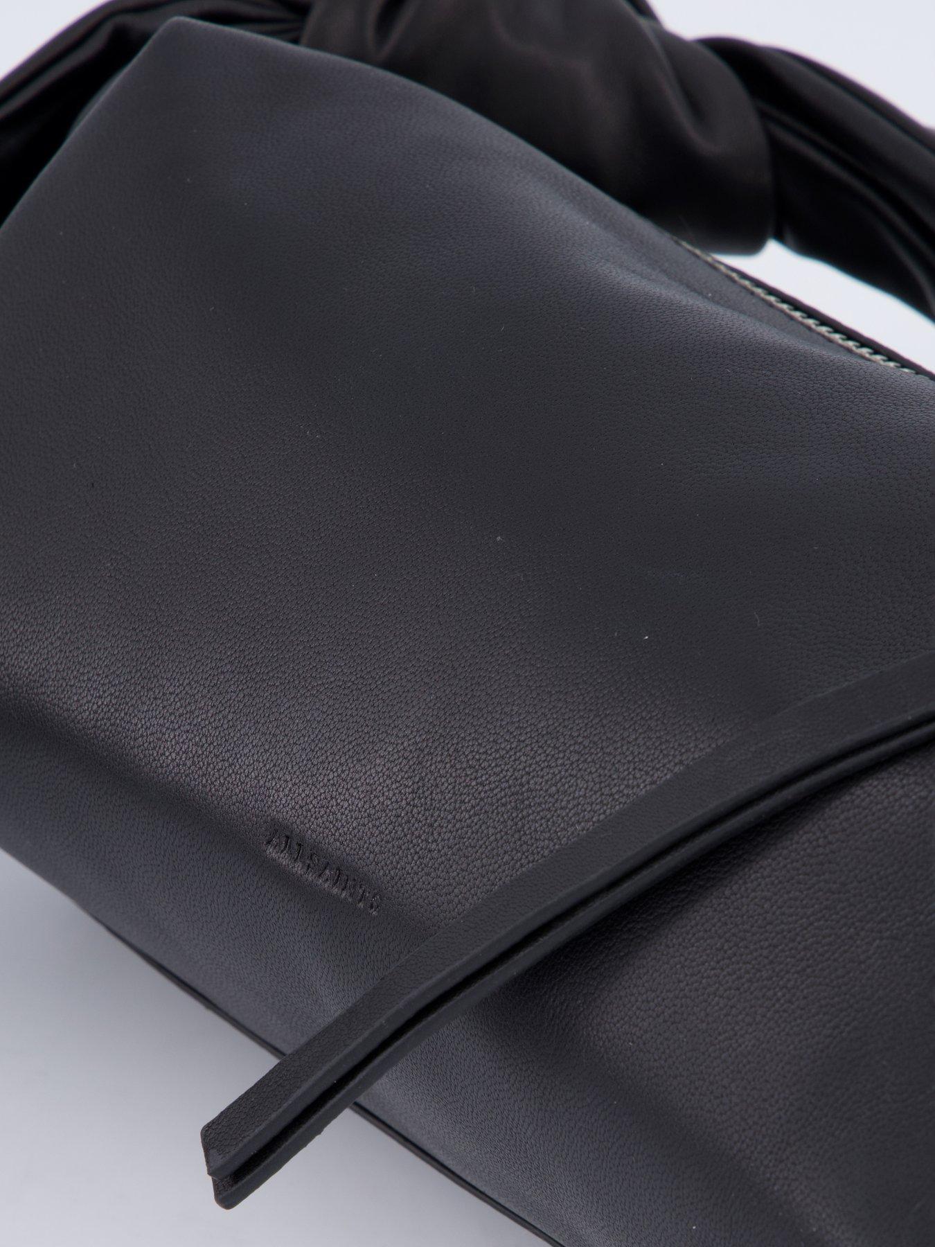 Image 5 of 5 of AllSaints Womens Knotted Strap Zip-Top Baguette Shoulder Bag - Black