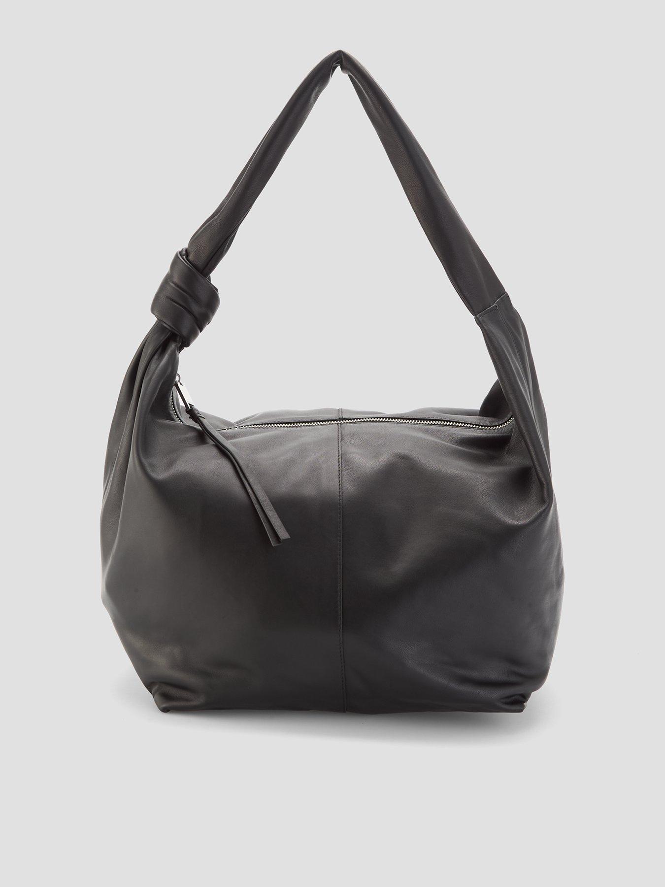 Image 1 of 4 of AllSaints Womens Knotted Strap Zip-Top Large Shoulder Bag - Black