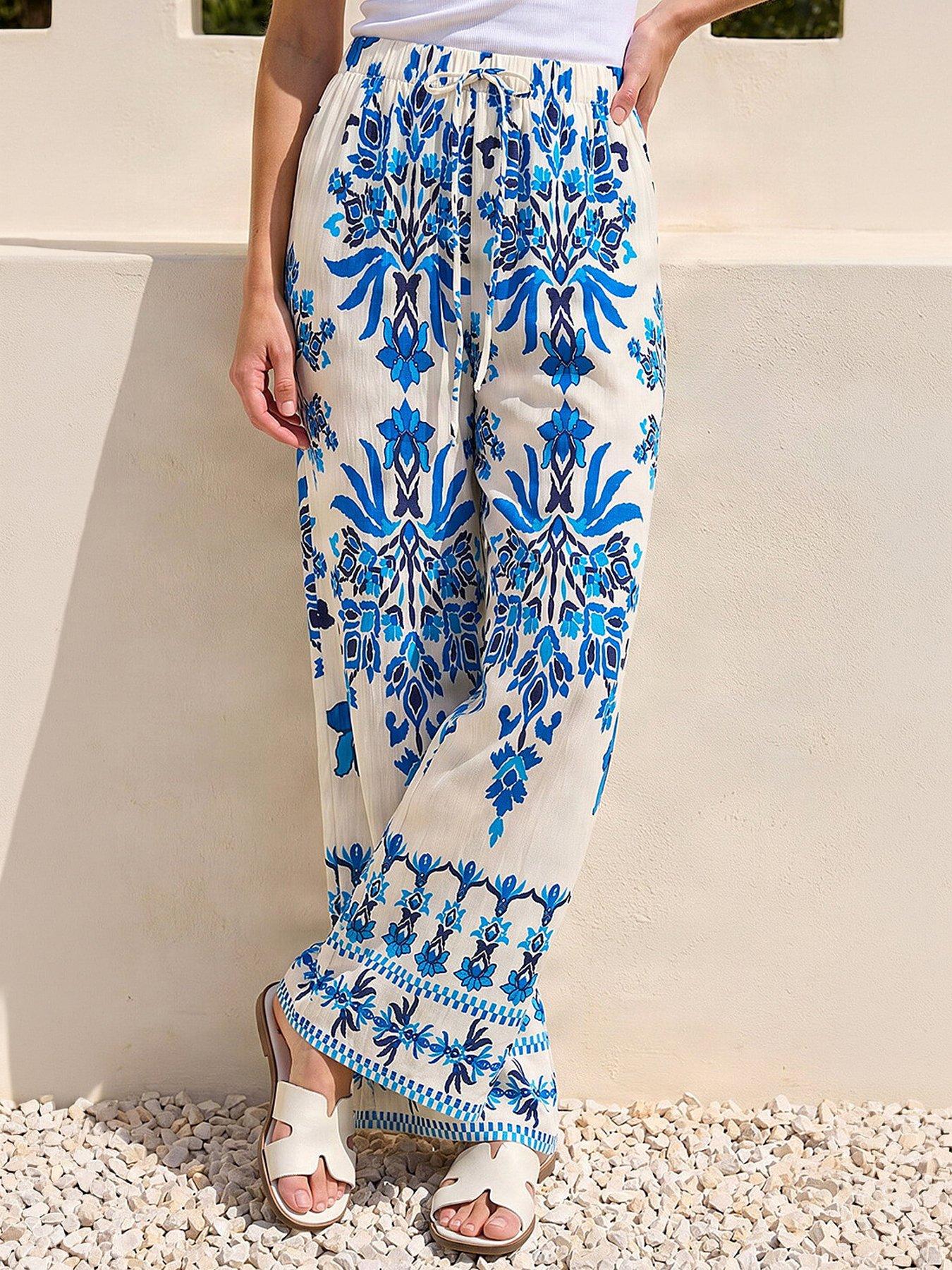 Image 1 of 4 of Roman Border Print Trousers