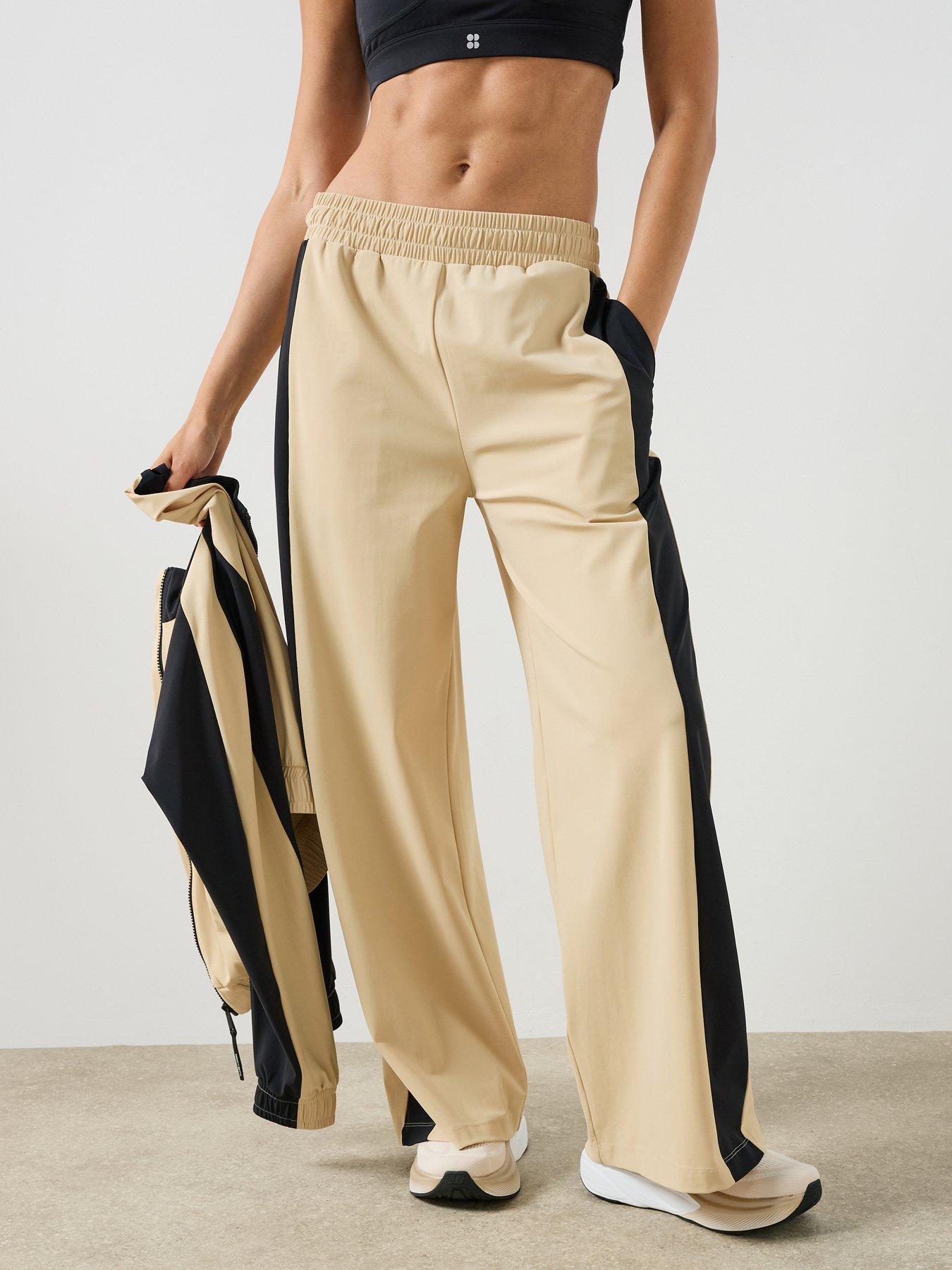 Image 1 of 6 of Sweaty Betty Womens Training Explorer Colour Block Regular Trouser - Beige