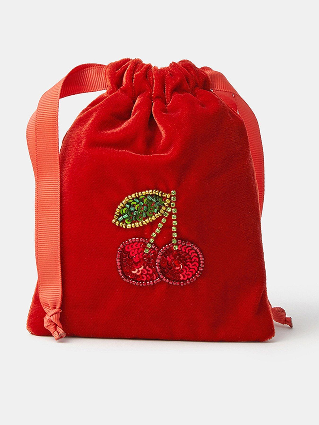 Image 1 of 3 of Accessorize Womens Cherry Sequin Drawstring Velvet Bag - Orange