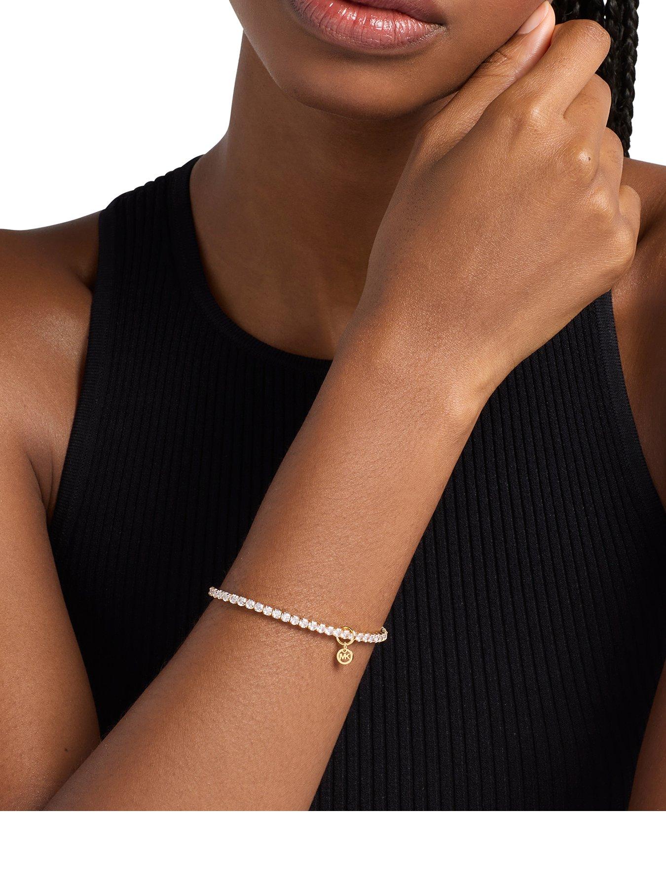 Image 1 of 4 of Michael Kors Stretch Tennis Bracelet - Gold