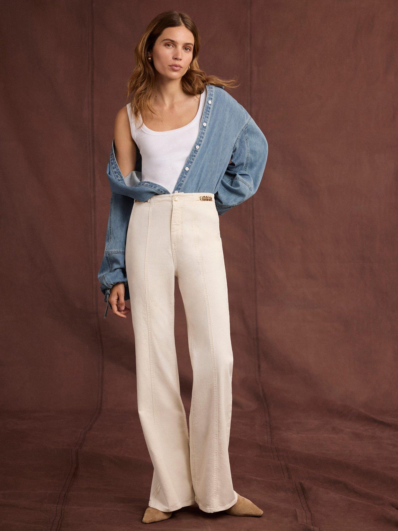 Image 1 of 6 of Mint Velvet Women's Gold-Tone Disc Detail Vintage Flare Jeans - Cream