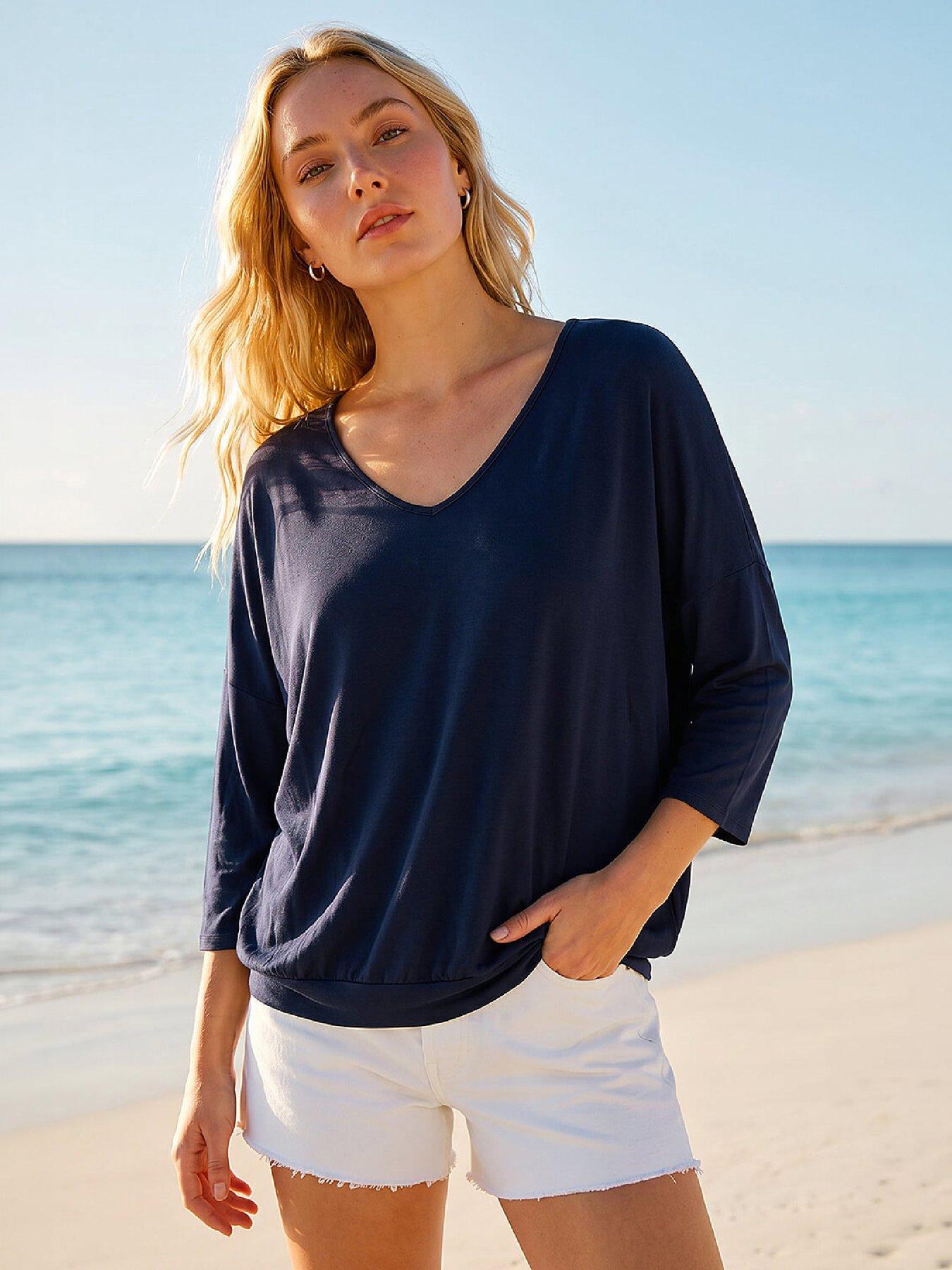 Image 1 of 4 of Roman Bubble Hem V-neck Top