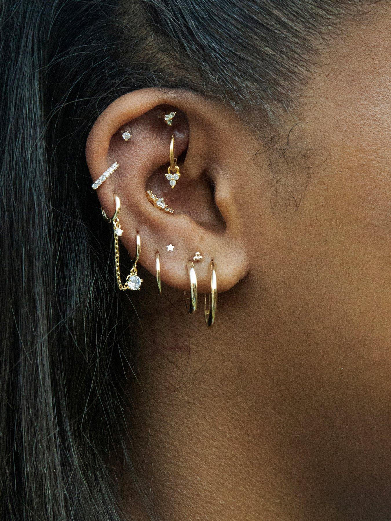 Image 5 of 7 of Seol + Gold 9ct Solid Gold Tiny Star Studs