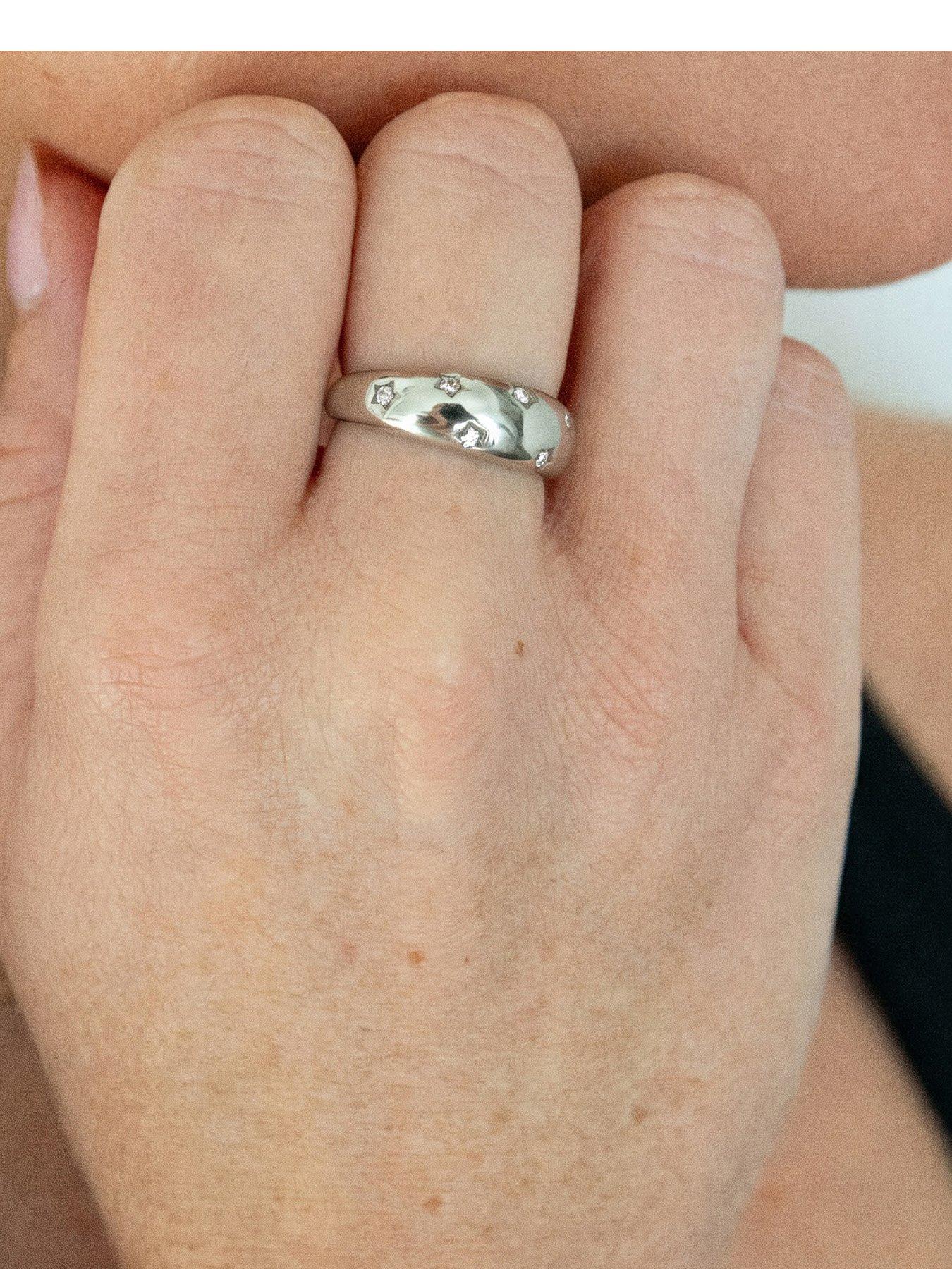 Image 1 of 7 of Seol + Gold Silver Stainless Steel CZ Starry Domed Ring