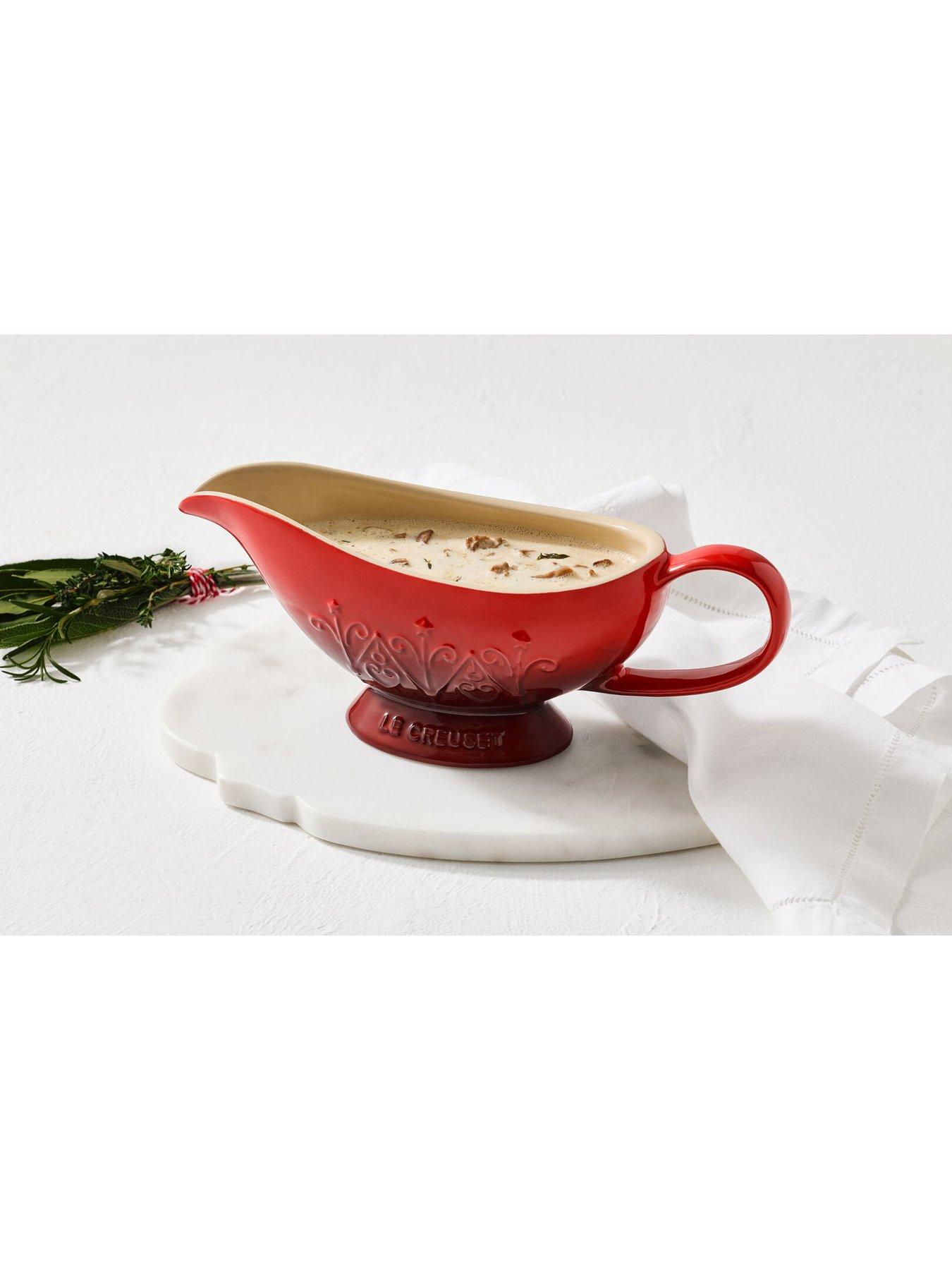 Image 6 of 6 of Le Creuset Stoneware Heritage Sauce Jug Christmas Relief Cerise