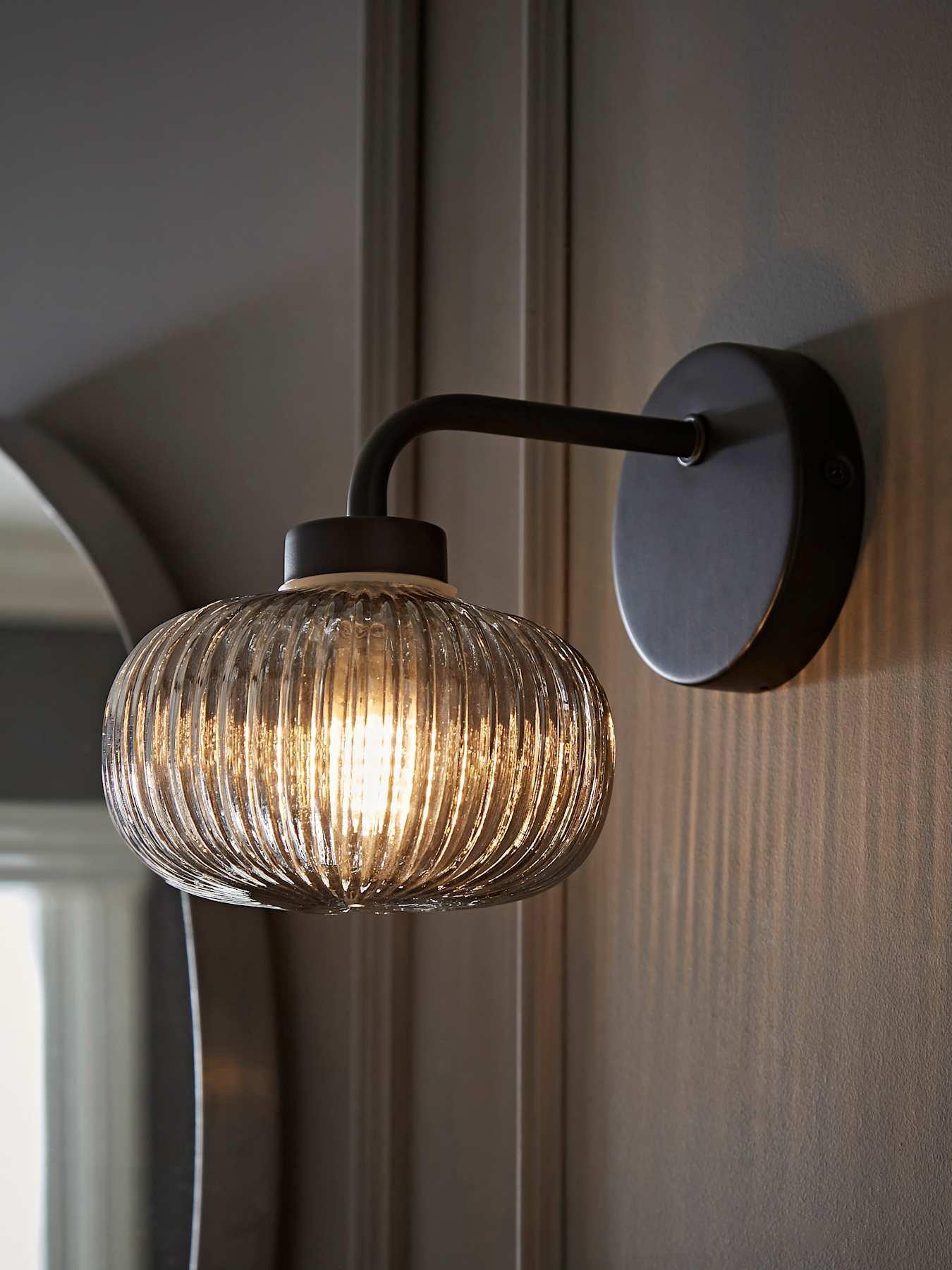 Image 1 of 7 of ValueLights Amaia Matt Black IP44 Wall Light with Smoked Ribbed Glass