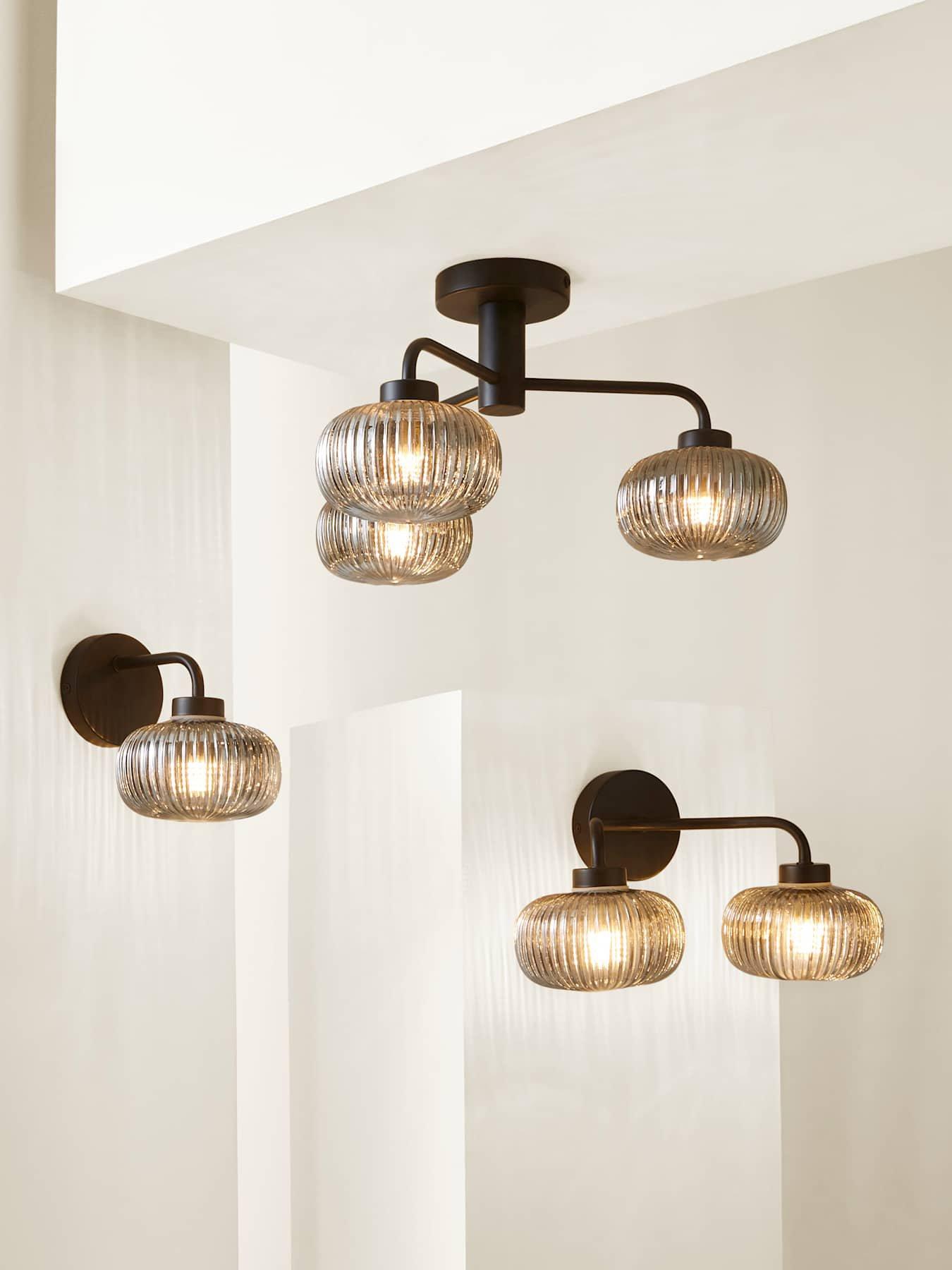Image 6 of 7 of ValueLights Amaia Matt Black IP44 Wall Light with Smoked Ribbed Glass