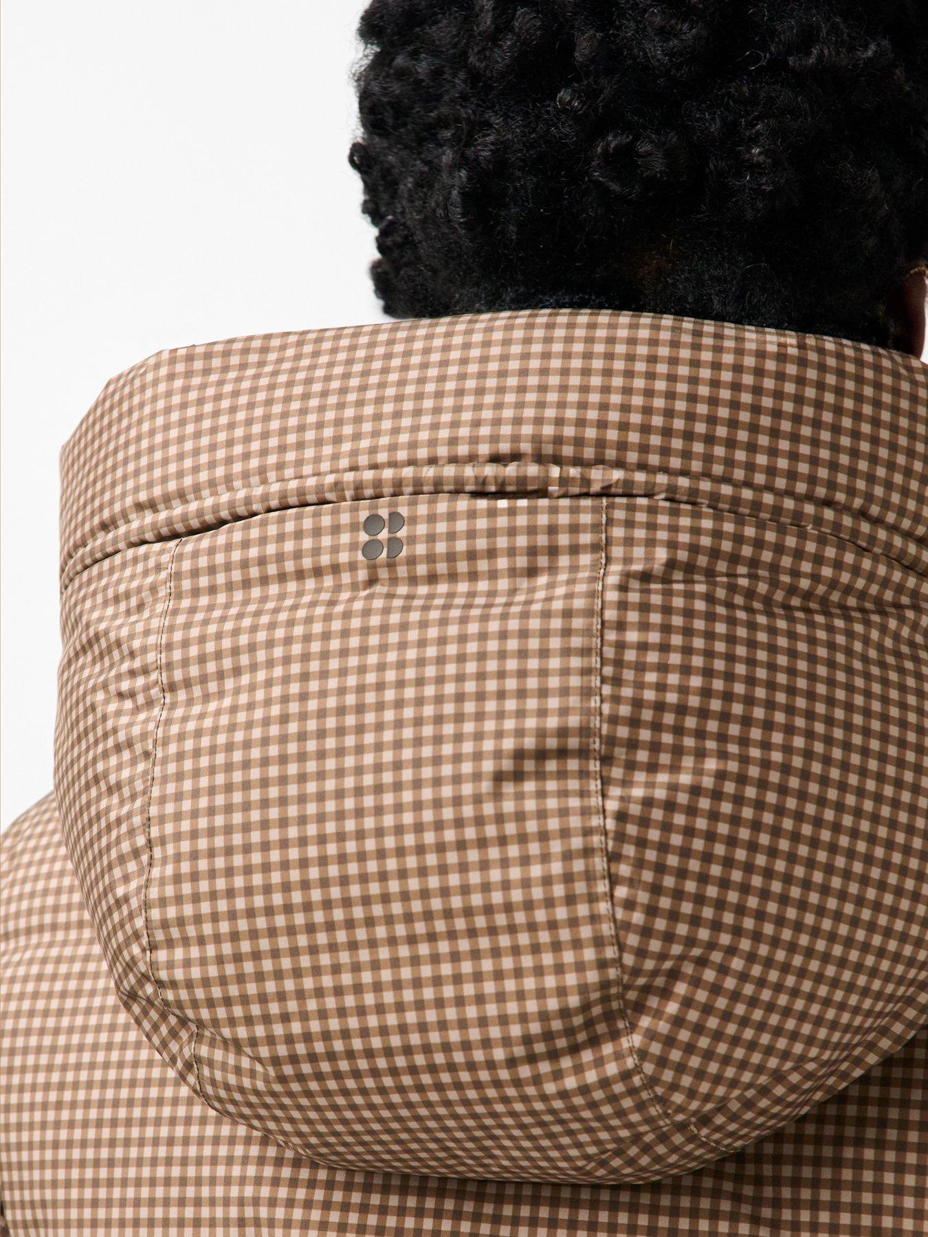Image 6 of 7 of Sweaty Betty Womens Nimbus Cinched Waist Hooded Puffer Jacket - Beige