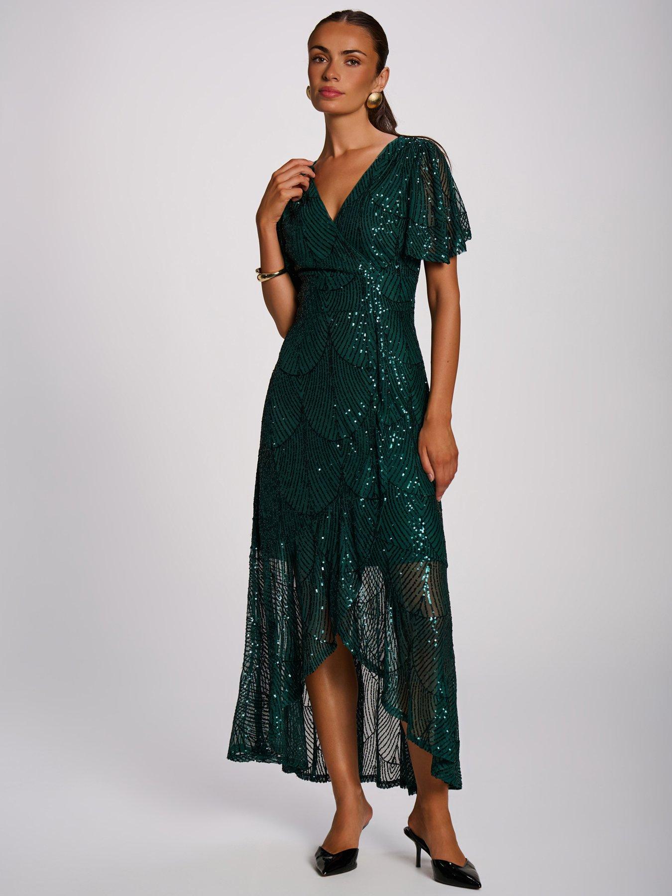 Image 1 of 7 of Jolie Moi Sequin Angel Sleeve Flare Hem Maxi Dress