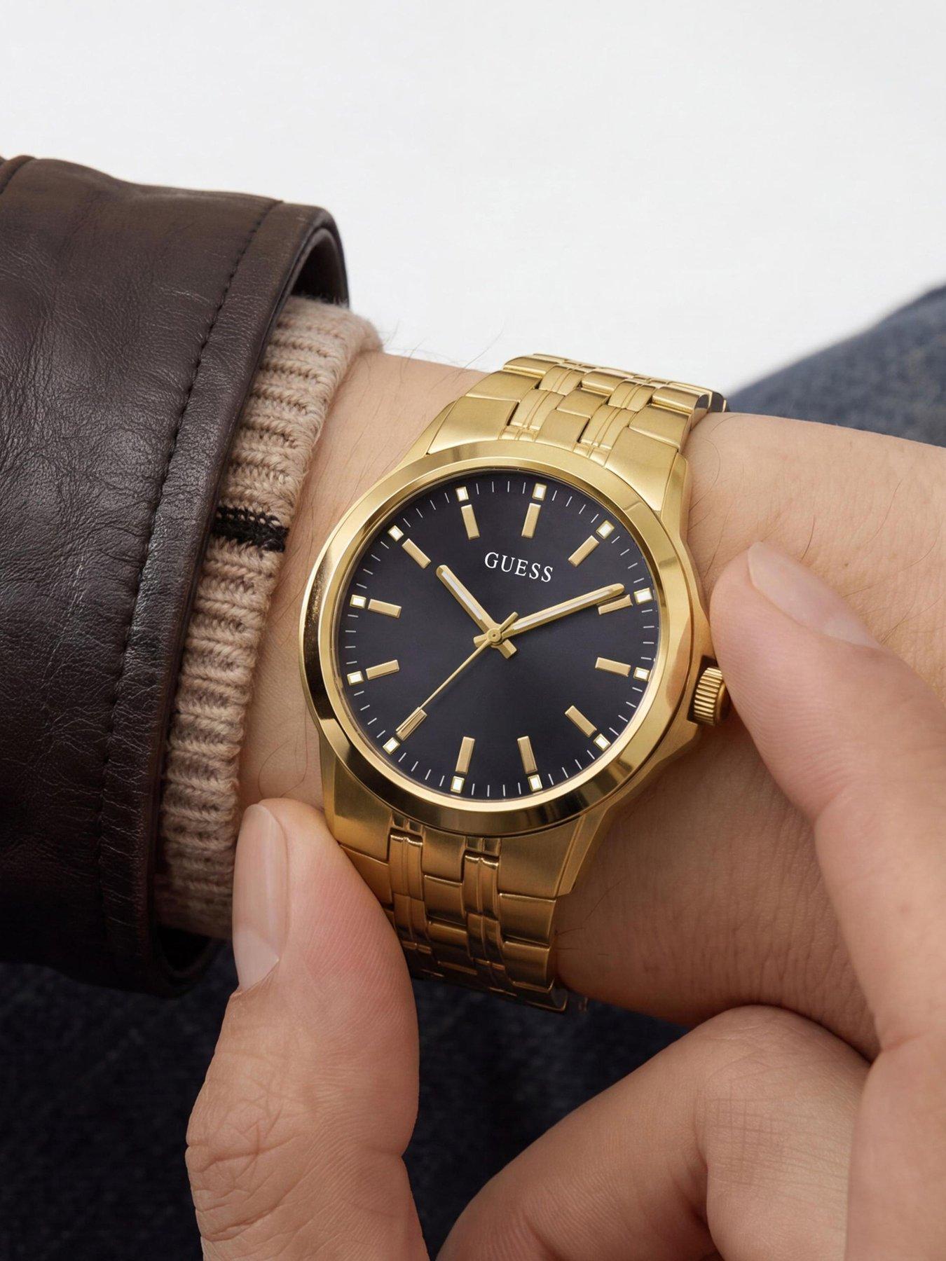 Image 2 of 6 of Guess Gents Gold tone stone set watch with black dial and gold tone bracelet