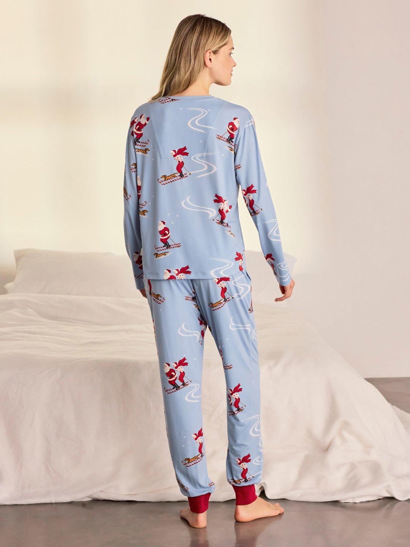 Image 2 of 7 of CHELSEA PEERS Womens Christmas Skiing Santa Print Long Pyjama Set - Blue