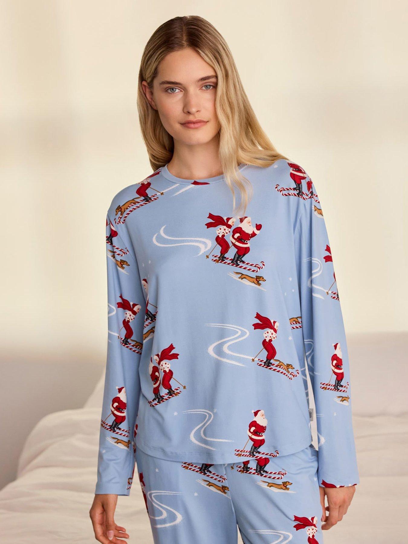 Image 4 of 7 of CHELSEA PEERS Womens Christmas Skiing Santa Print Long Pyjama Set - Blue
