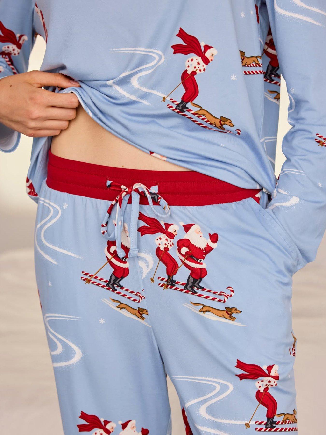 Image 5 of 7 of CHELSEA PEERS Womens Christmas Skiing Santa Print Long Pyjama Set - Blue