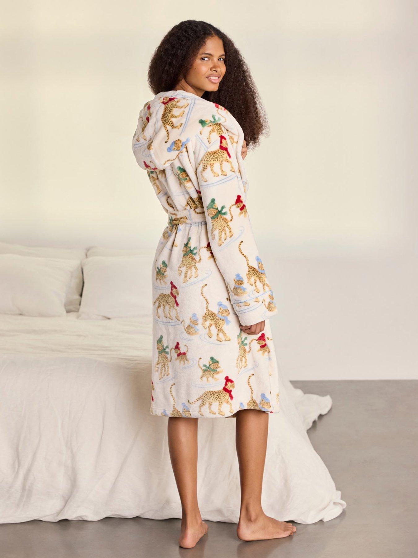 Image 2 of 6 of CHELSEA PEERS Fleece Ice Skating Leopards Print Hooded Dressing Gown - Off White