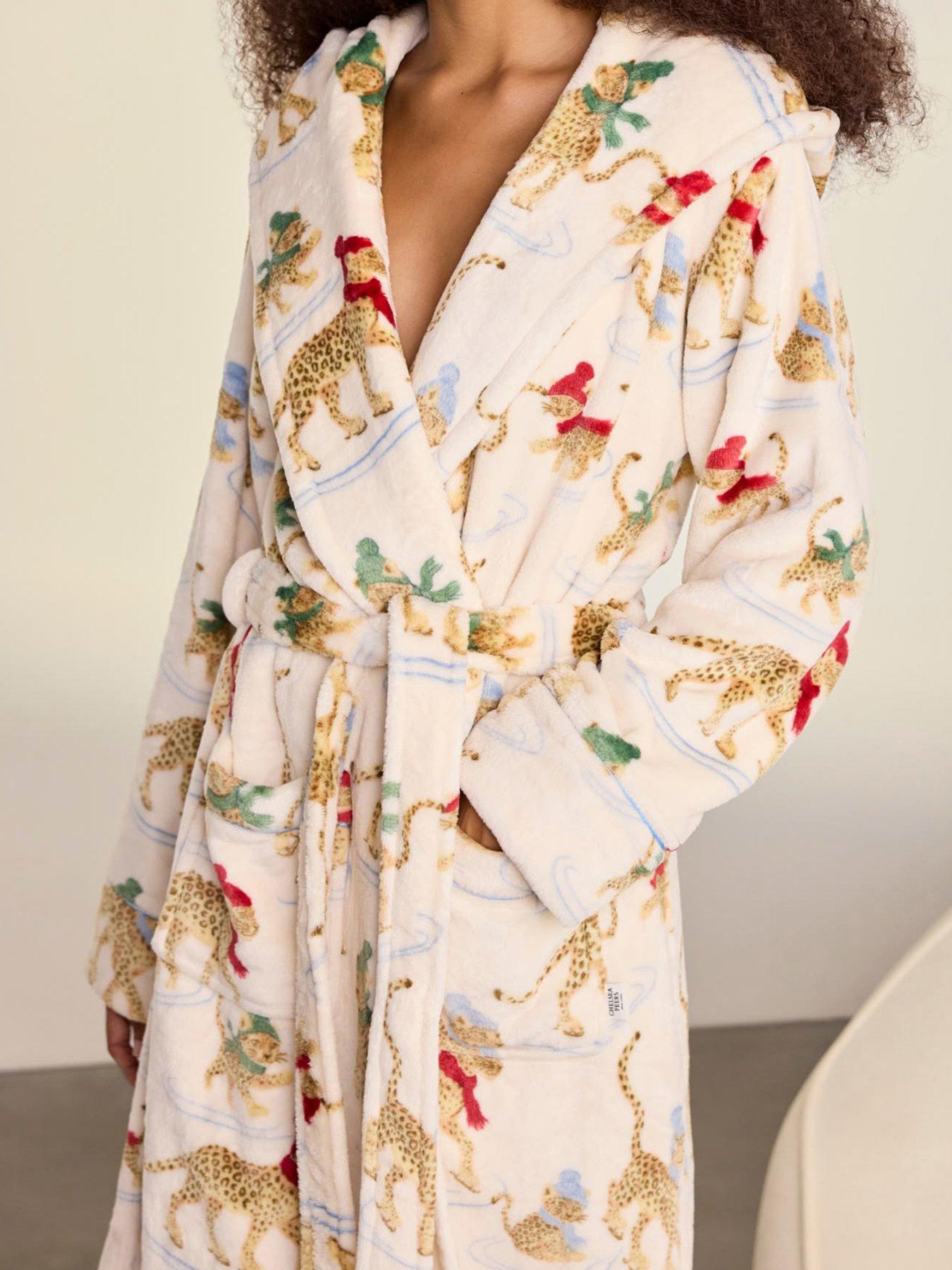 Image 4 of 6 of CHELSEA PEERS Fleece Ice Skating Leopards Print Hooded Dressing Gown - Off White